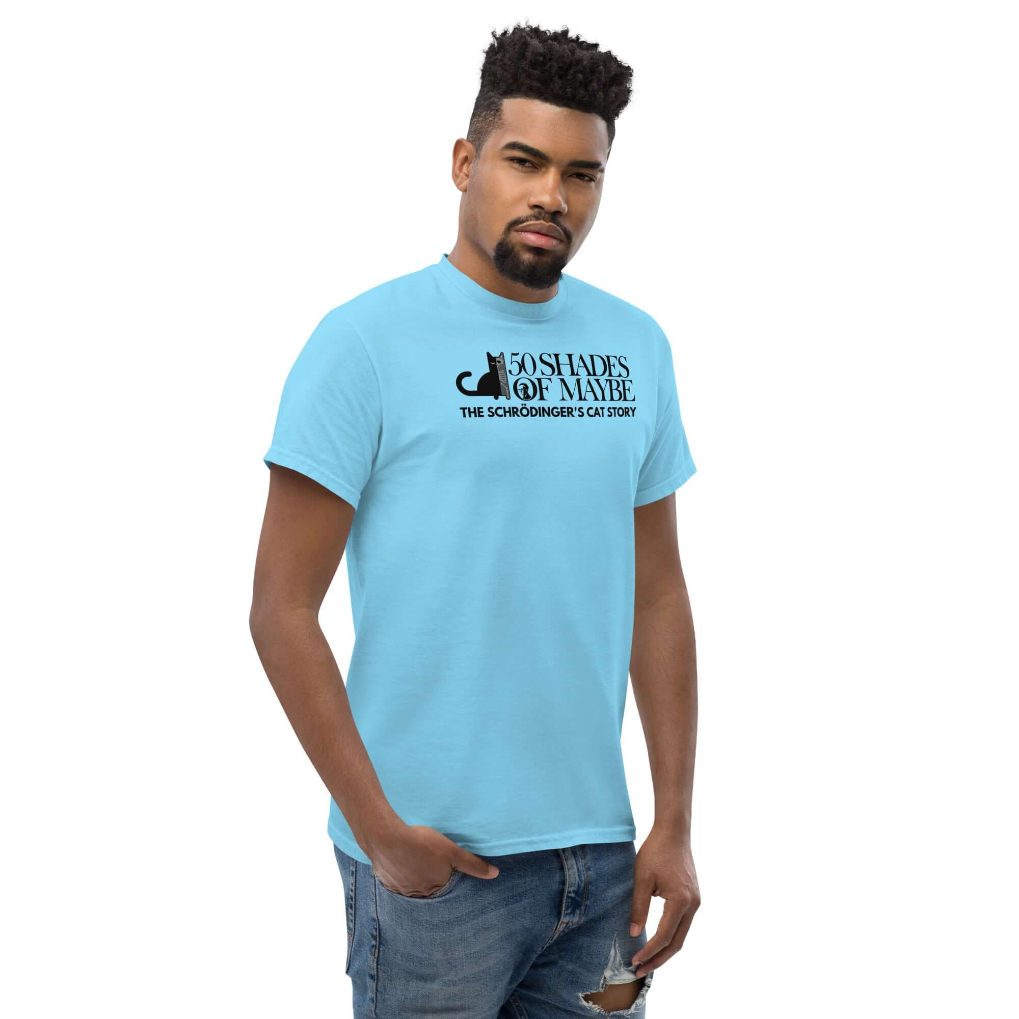 Man wearing blue Schrödinger's Cat parody t-shirt with '50 Shades of Maybe' text, blending humor with quantum physics and literature themes.