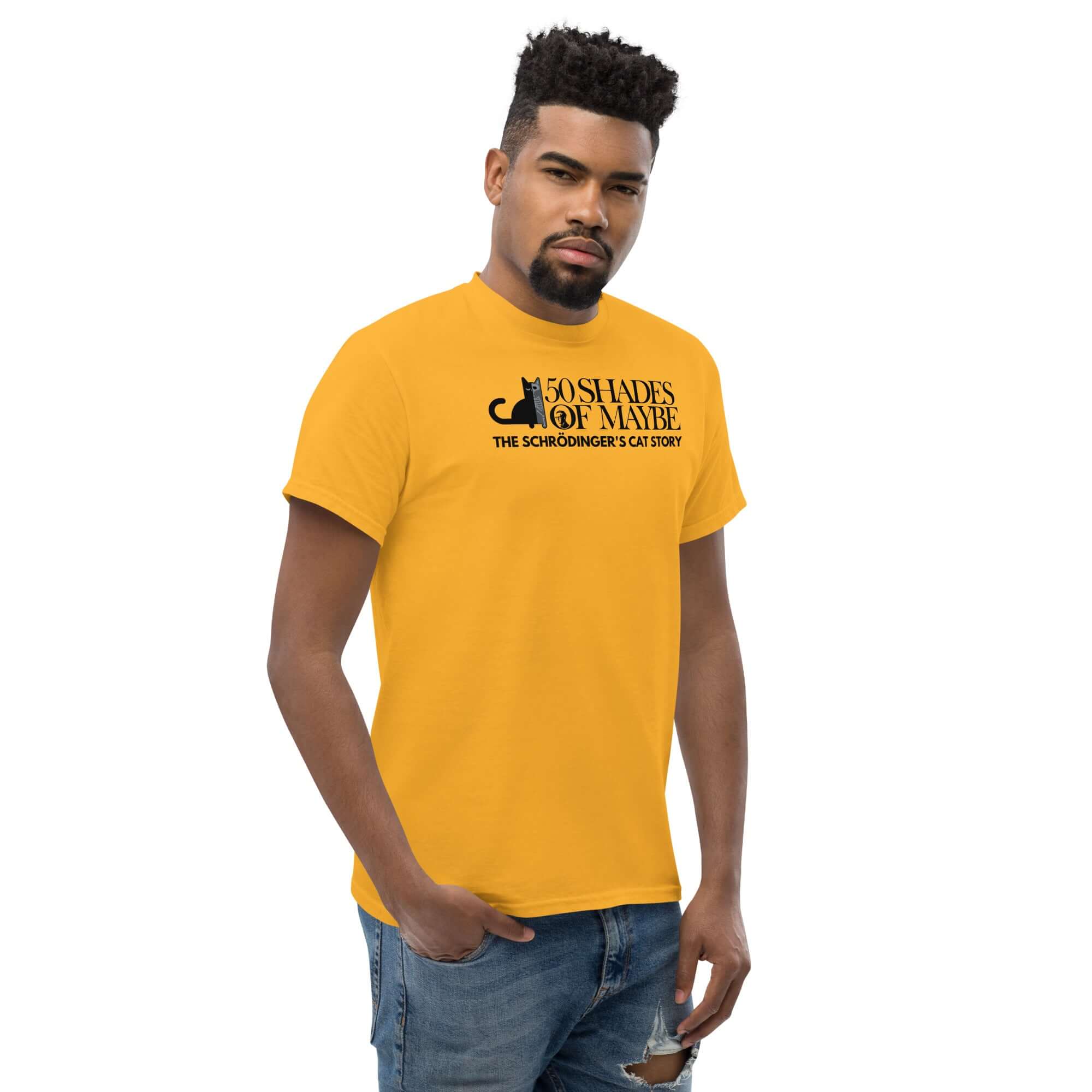 Man wearing "50 Shades of Maybe" Schrödinger's Cat parody t-shirt, featuring a cat silhouette on yellow fabric, blending quantum physics humor.