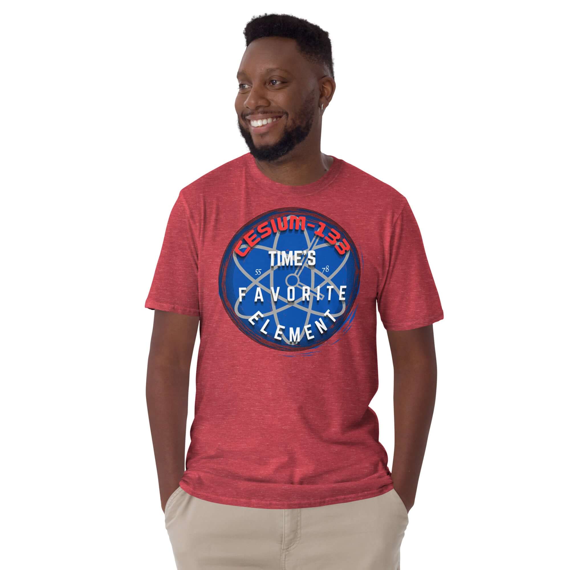 Person wearing a red T-shirt with a blue Cesium-133 Atomic Clock design captioned 'Time's Favorite Element'.
