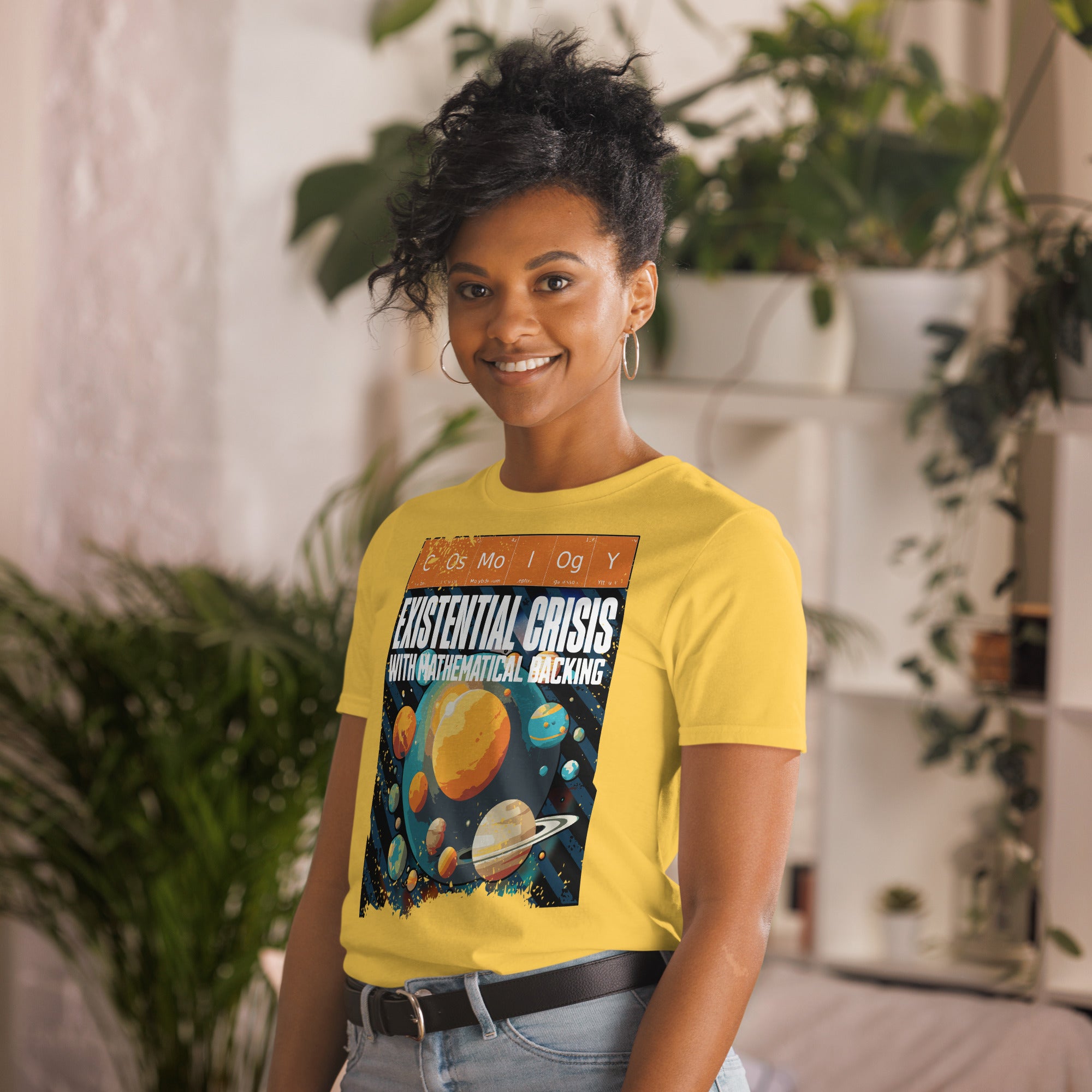 Person wearing Cosmology T-Shirt, featuring planets, periodic elements, and 'Existential Crisis With Mathematical Backing' design.