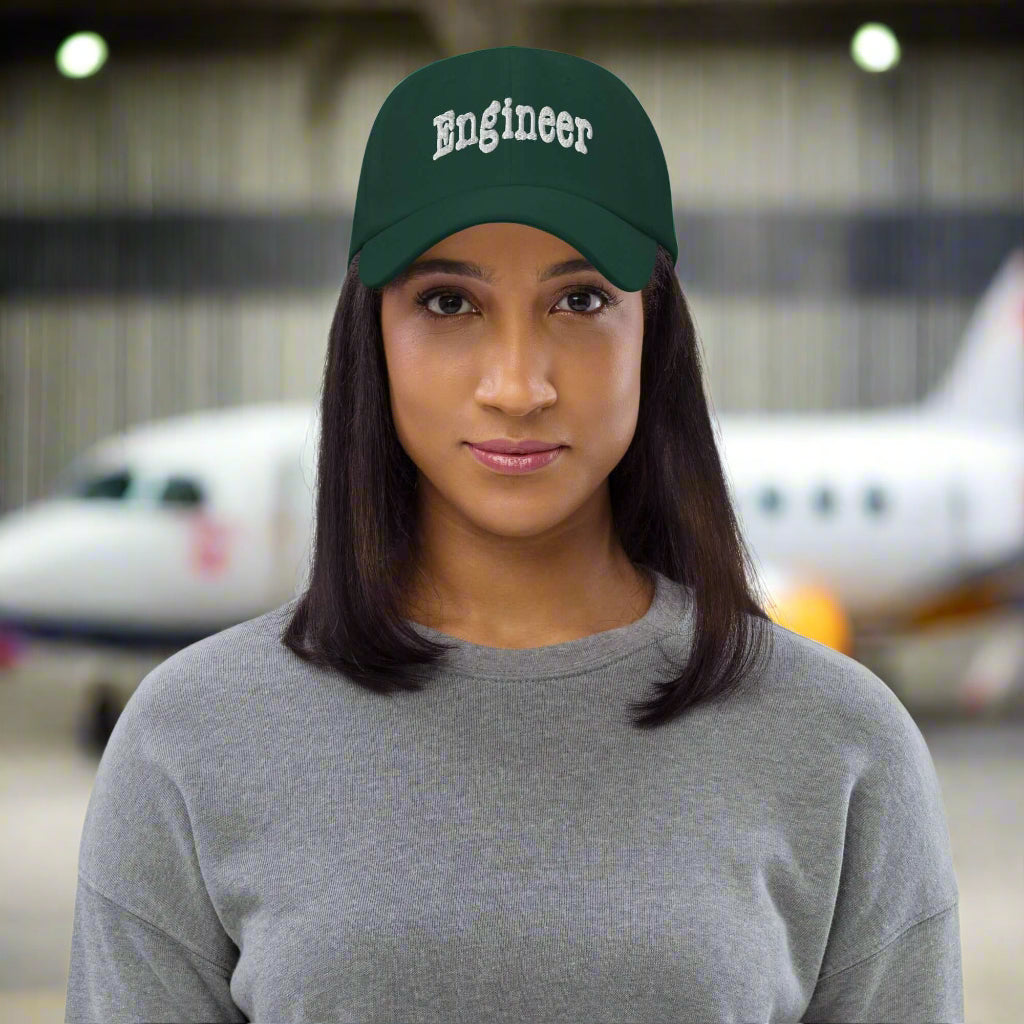Woman wearing "ENGINEER" baseball cap, showcasing problem-solving prowess and professional style.