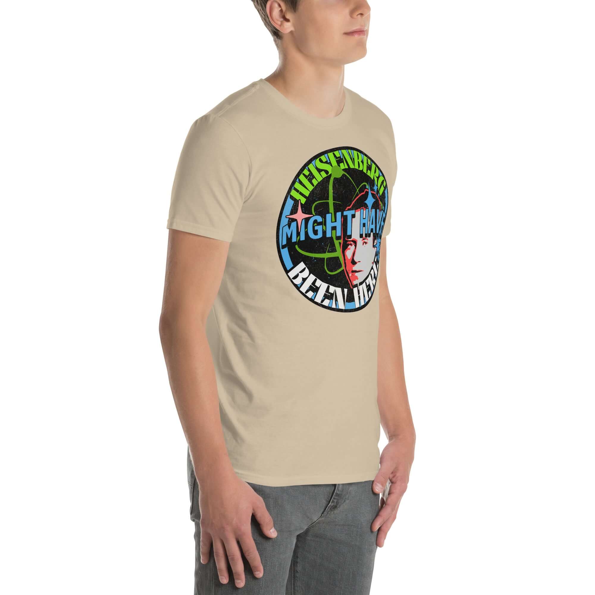 Heisenberg Might Have Been Here T-Shirt featuring quantum physics humor with atomic symbols and starbursts design.