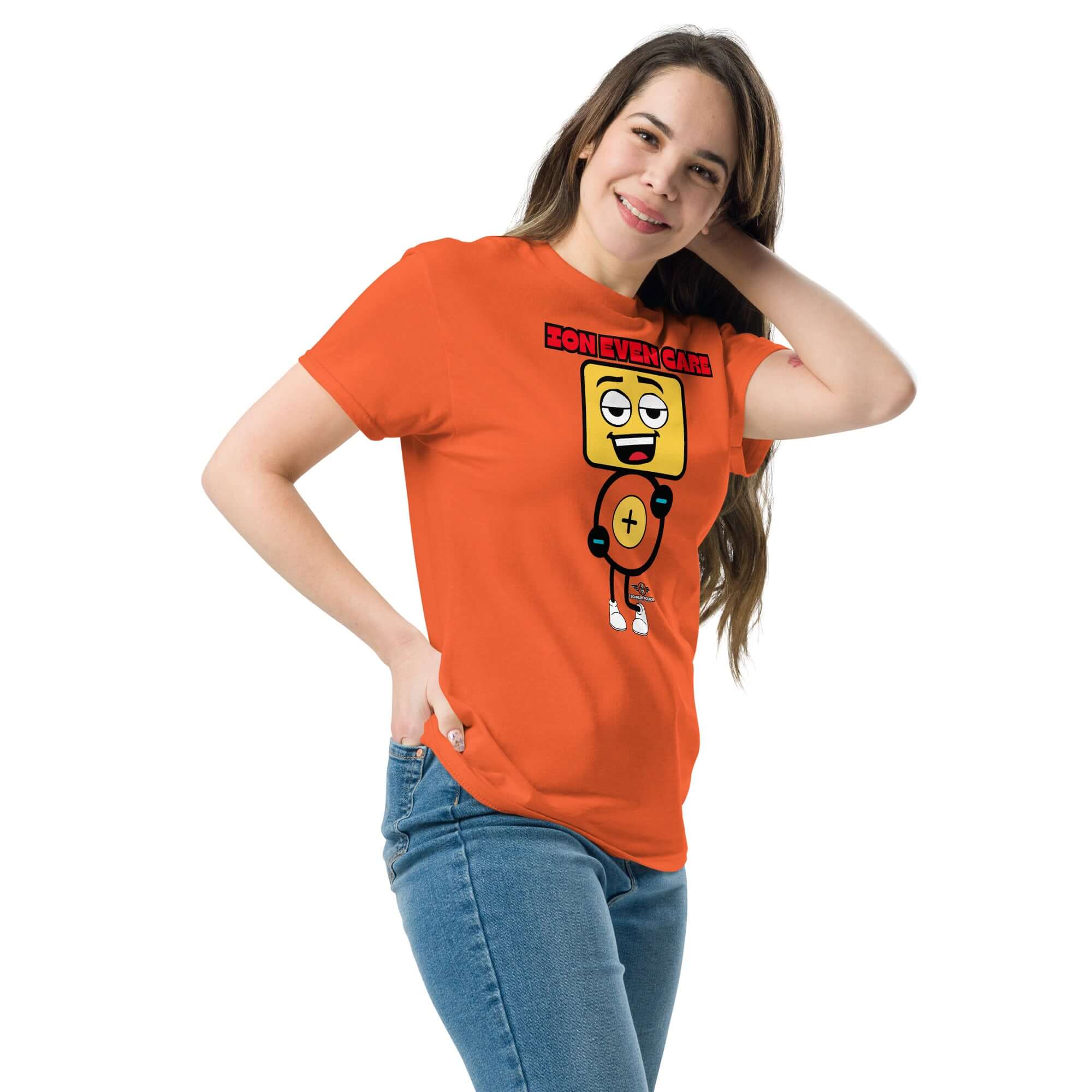 Woman wearing an orange 'Ion Even Care' T-shirt with an atomic character design, combining science and humor for casual style.