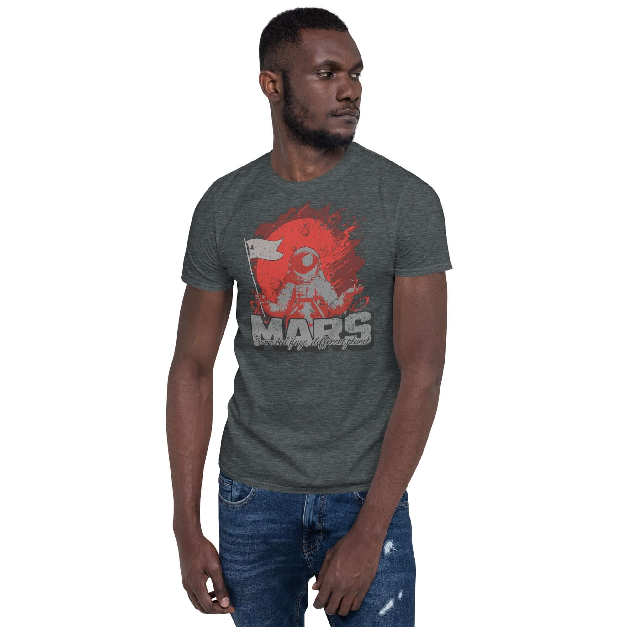 Model wearing "Mars - Same Red Flags, Different Planet" t-shirt featuring astronaut design; space humor, cosmic concerns theme.