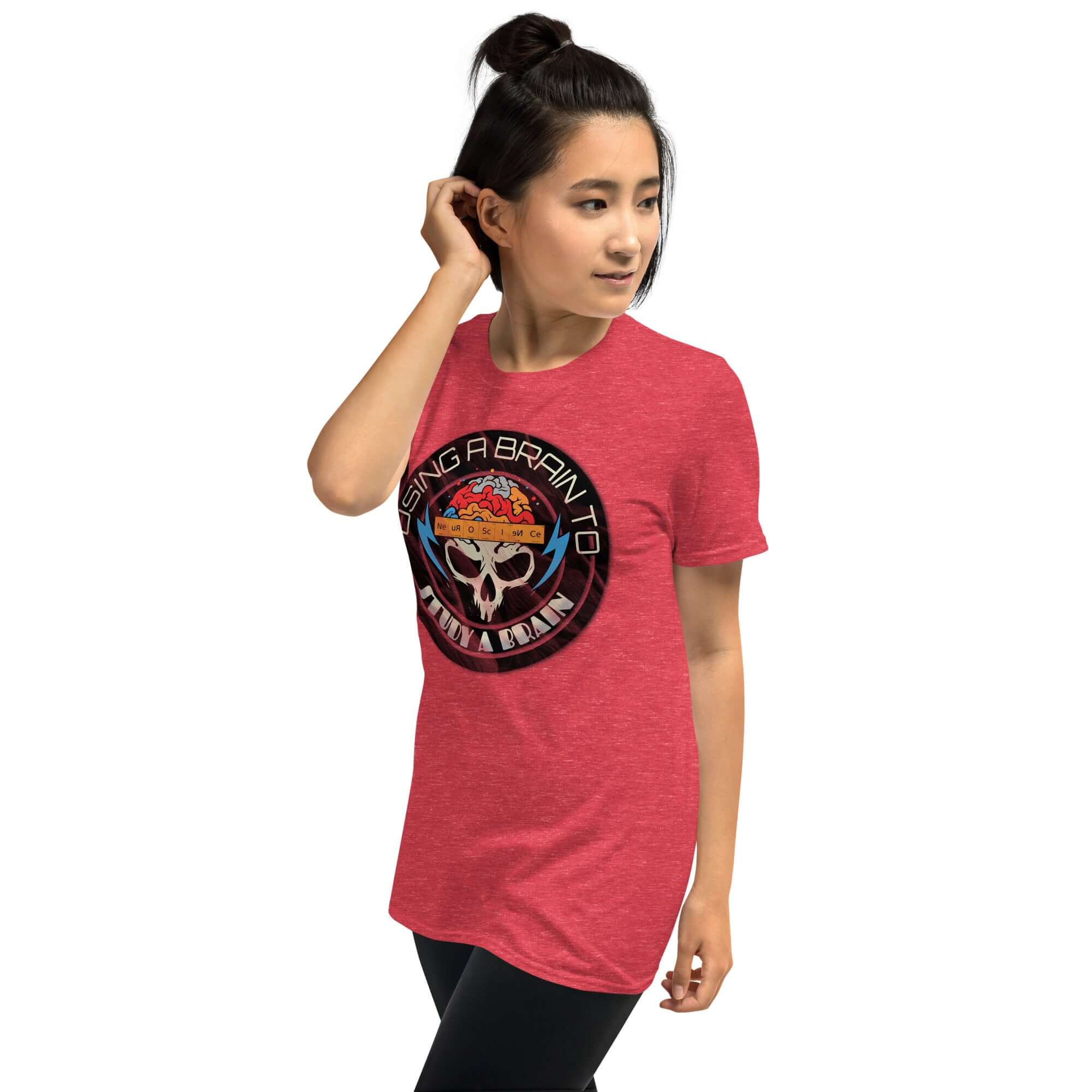 Woman wearing red 'Using A Brain To Study A Brain' neuroscience T-shirt with brain and skull design, showcasing science humor.