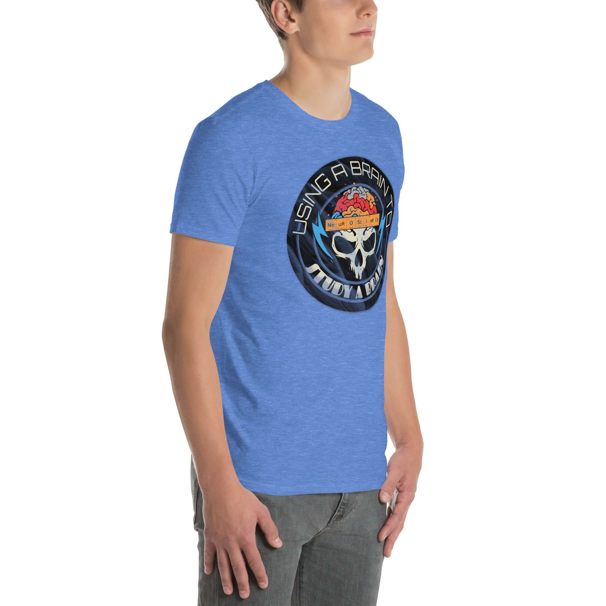 Blue neuroscience T-shirt featuring skull-and-crossbones design with 'Using A Brain To Study A Brain' slogan, science humor theme.