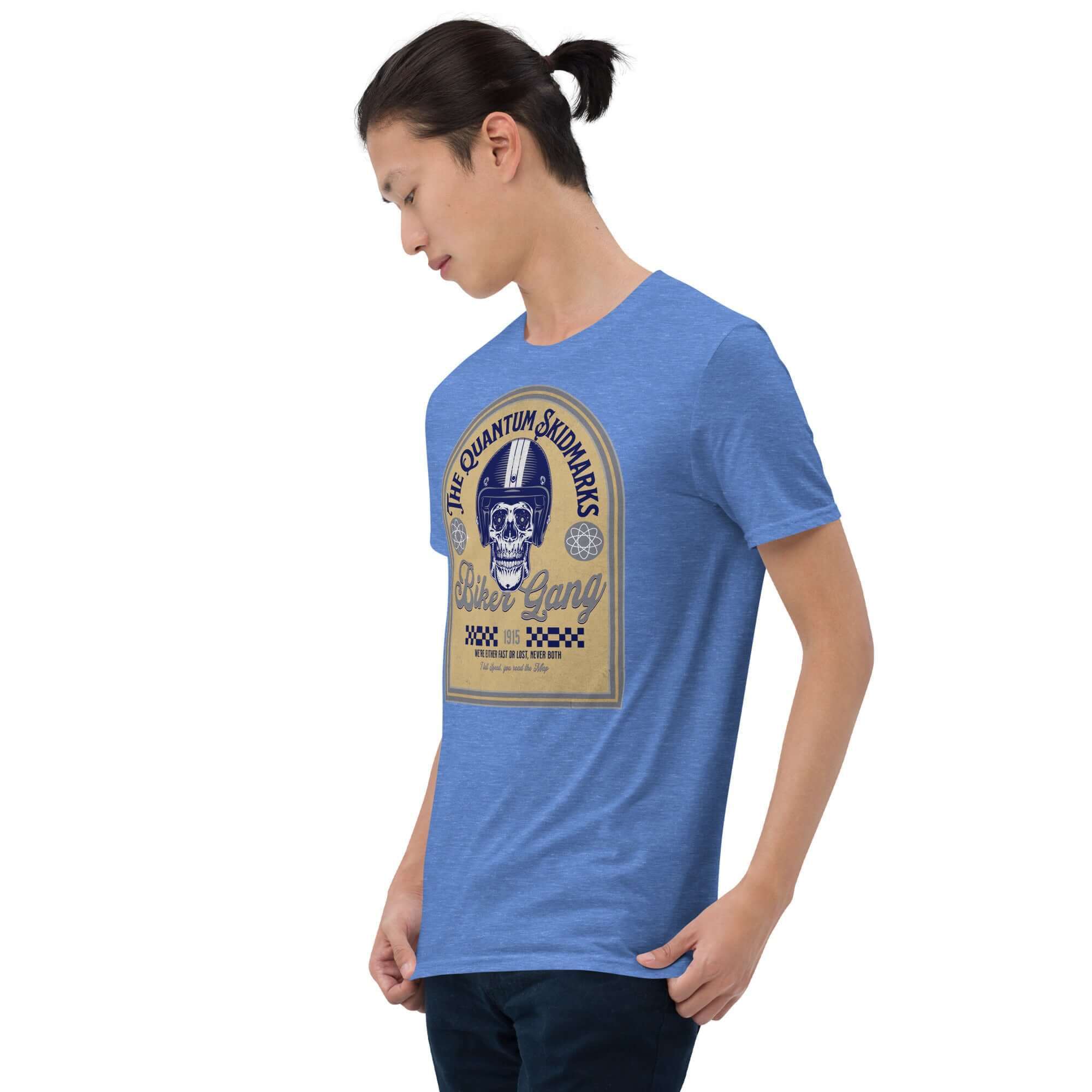 Man wearing Quantum Skidmarks Motorcycle Club T-Shirt featuring a skull design, blue Physics Biker Gang Tee