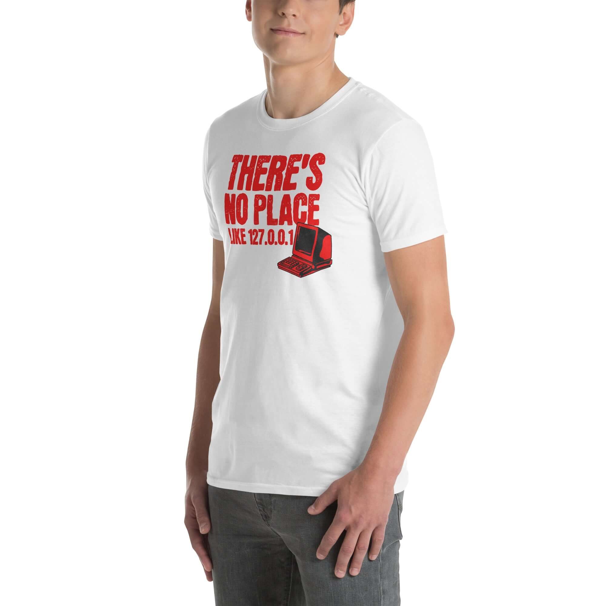 White T-shirt with 'There's No Place Like 127.0.0.1' in red text, referencing localhost IP, worn by a person, tech humor fashion.