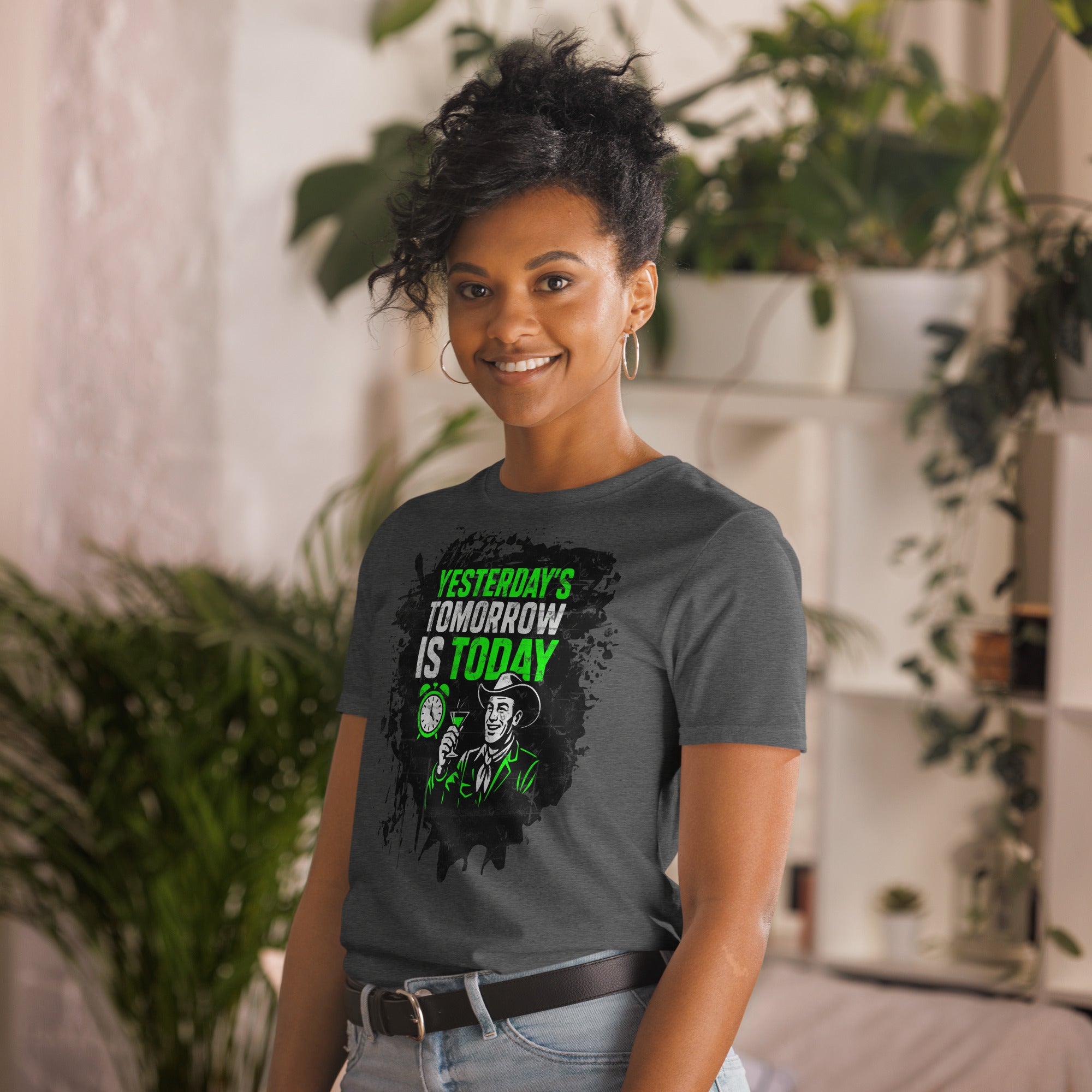 Woman wearing "Yesterday's Tomorrow Is Today" t-shirt, featuring dystopian future design with green typography.