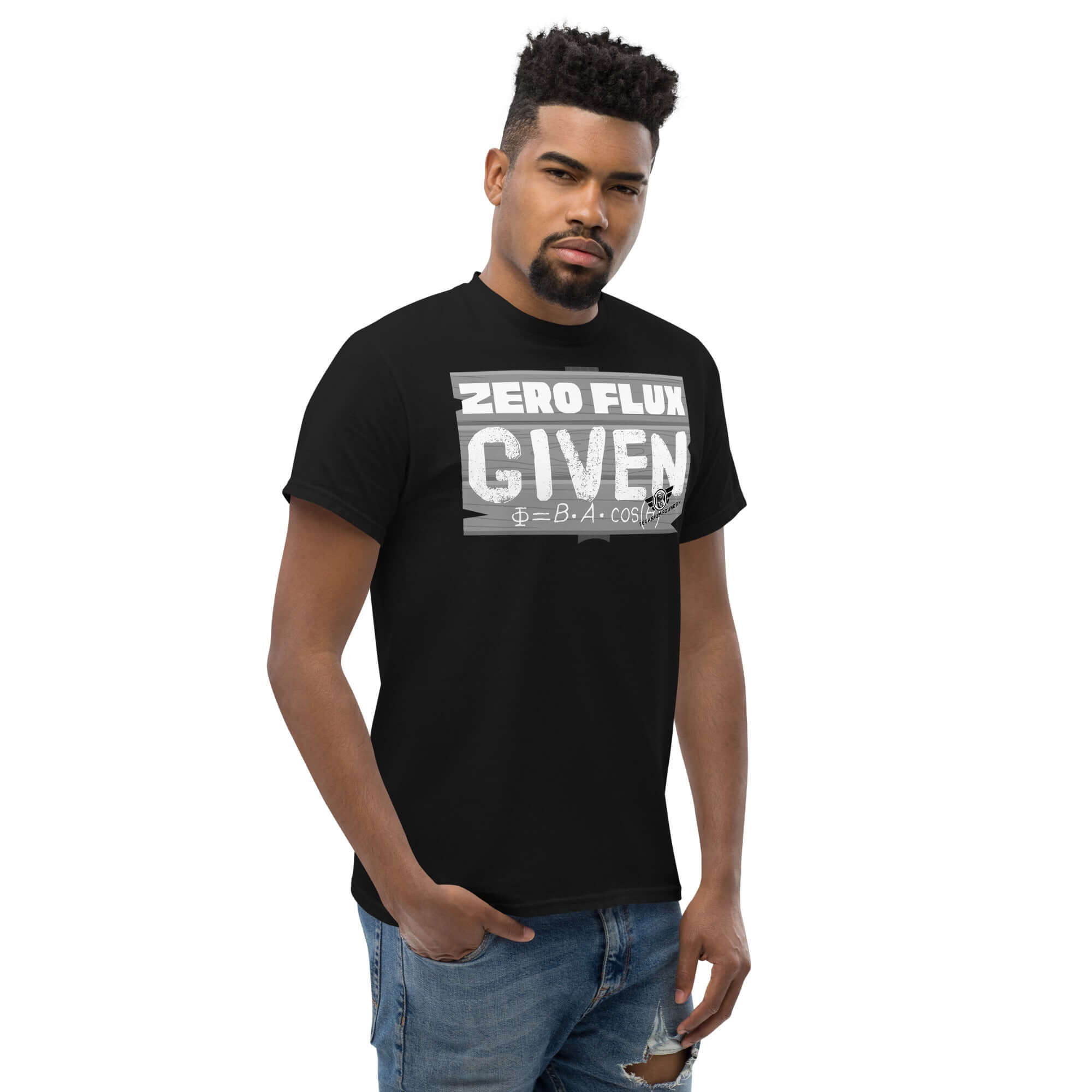 Man wearing Zero Flux Given T-shirt with magnetic field equation in chalkboard style, combining physics and humor.