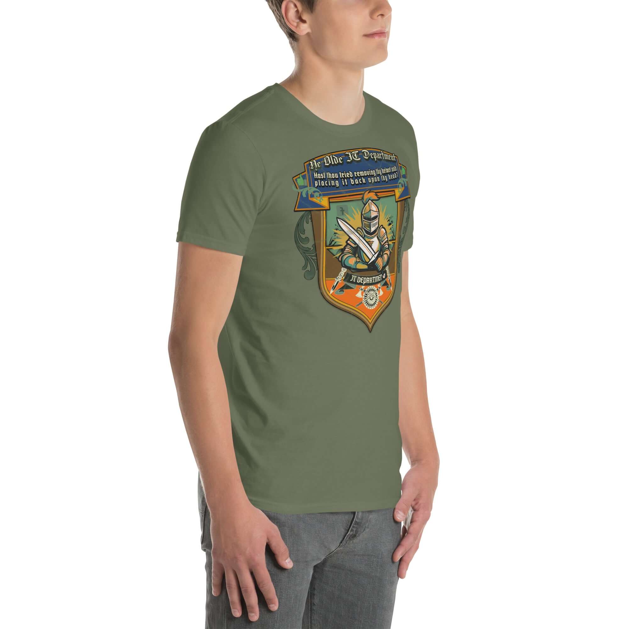 Man wearing "Ye Olde IT Department" t-shirt with medieval tech support humor design and knight graphic on olive green fabric.