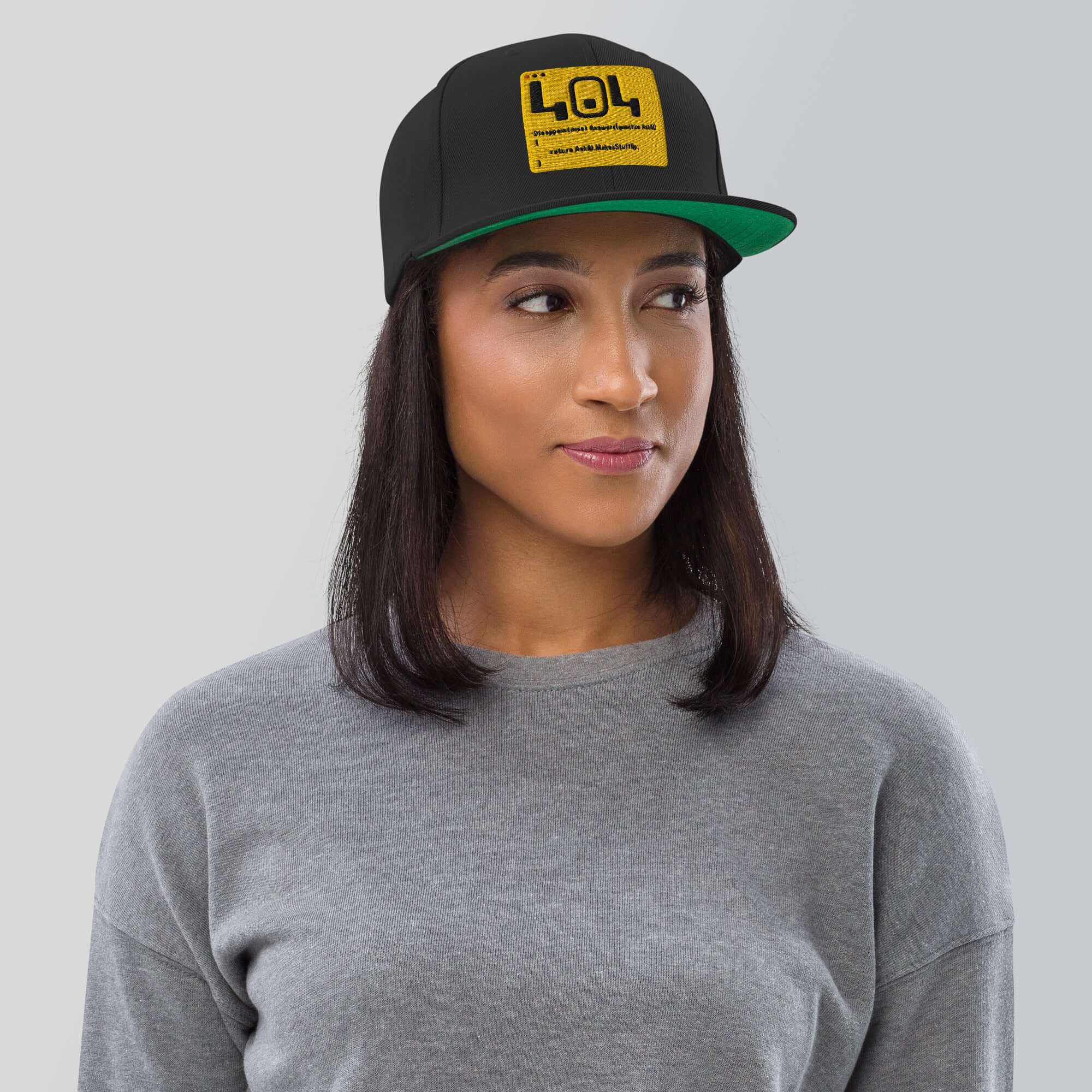404 Disappointment Hat worn by a person, showcasing developer humor with error code design. Perfect snapback for programmers.