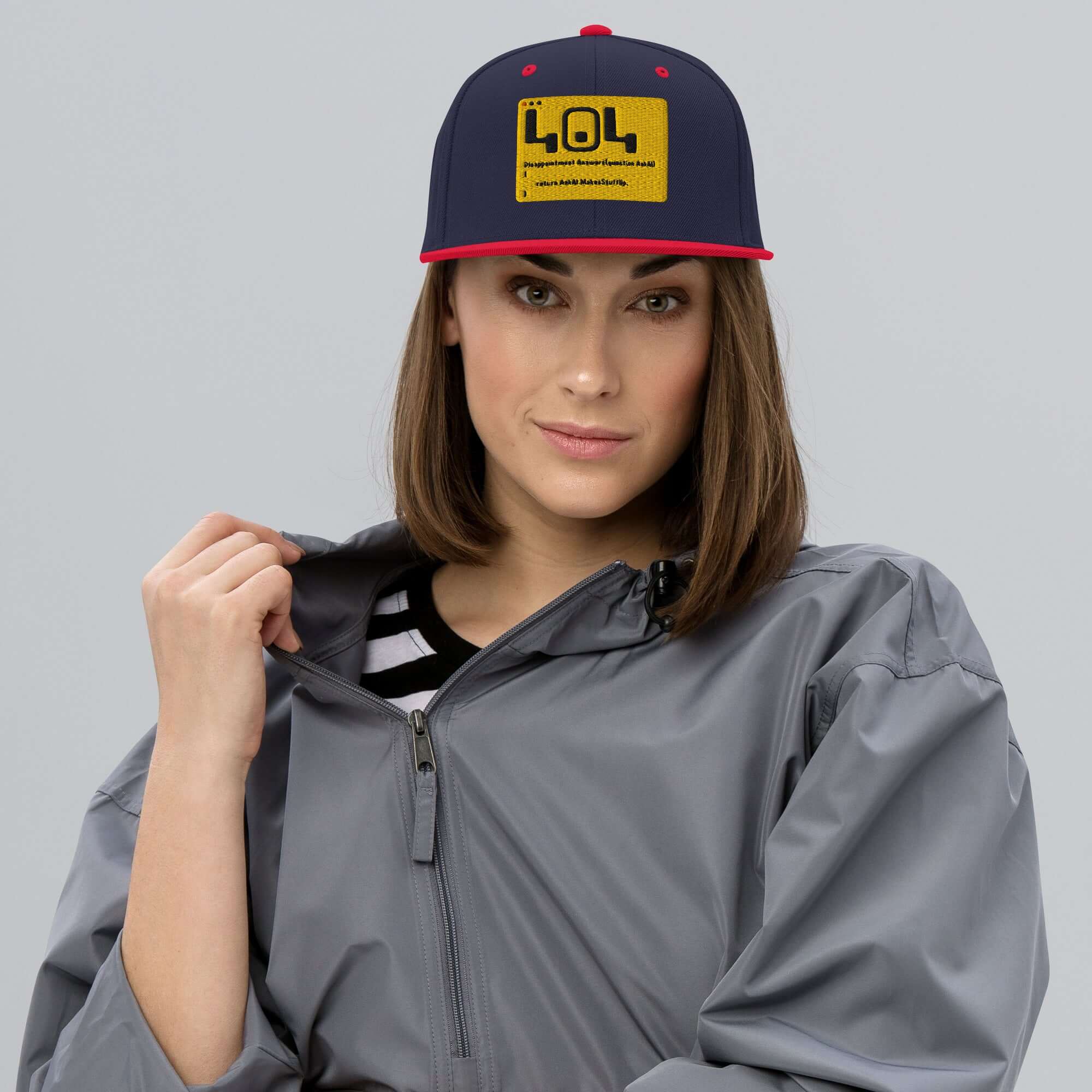 Woman wearing 404 Disappointment Hat; developer humor snapback showcasing error code with style and wit.