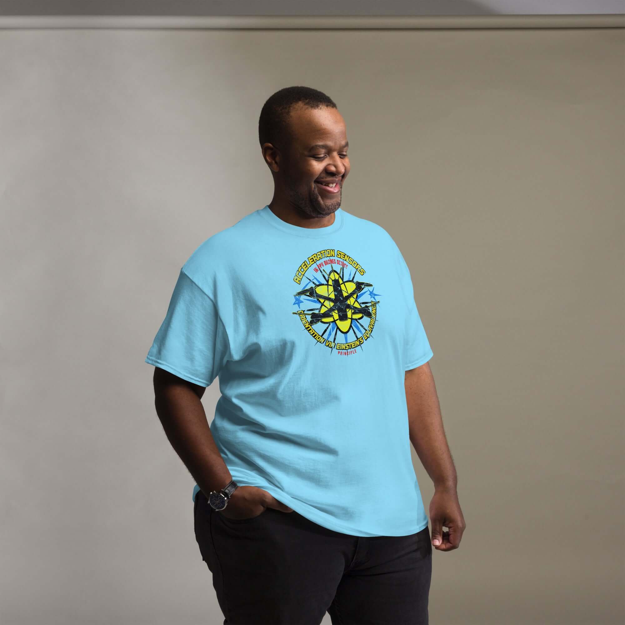 Man wearing Acceleration Sensors in FPV Drones T-Shirt with stylized drone and physics design.