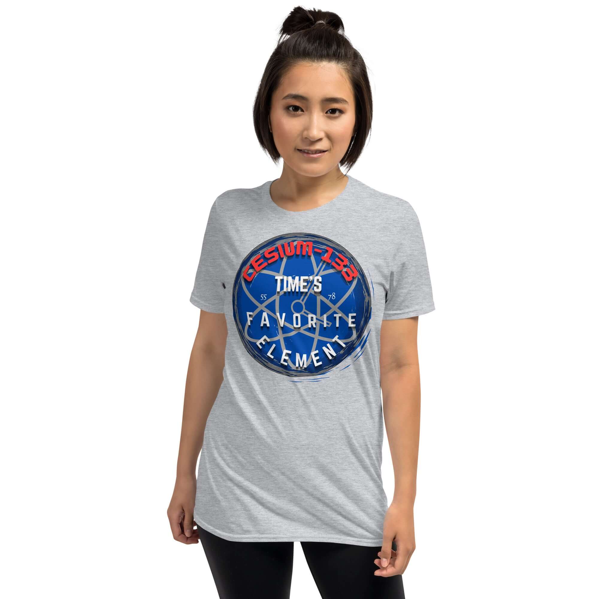 Model wears Cesium-133 Atomic Clock T-Shirt with "Time's Favorite Element" design, highlighting quantum-mechanical precision in style.