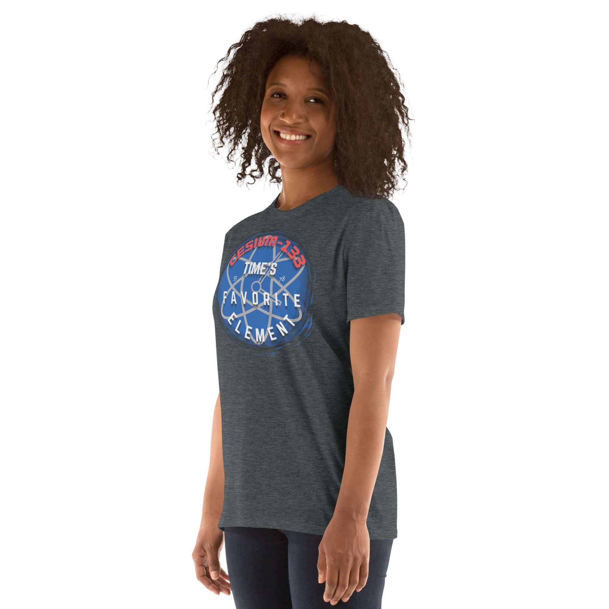 Person wearing Cesium-133 Atomic Clock T-Shirt in gray with blue design, "Time's Favorite Element" showcasing precision timekeeping.