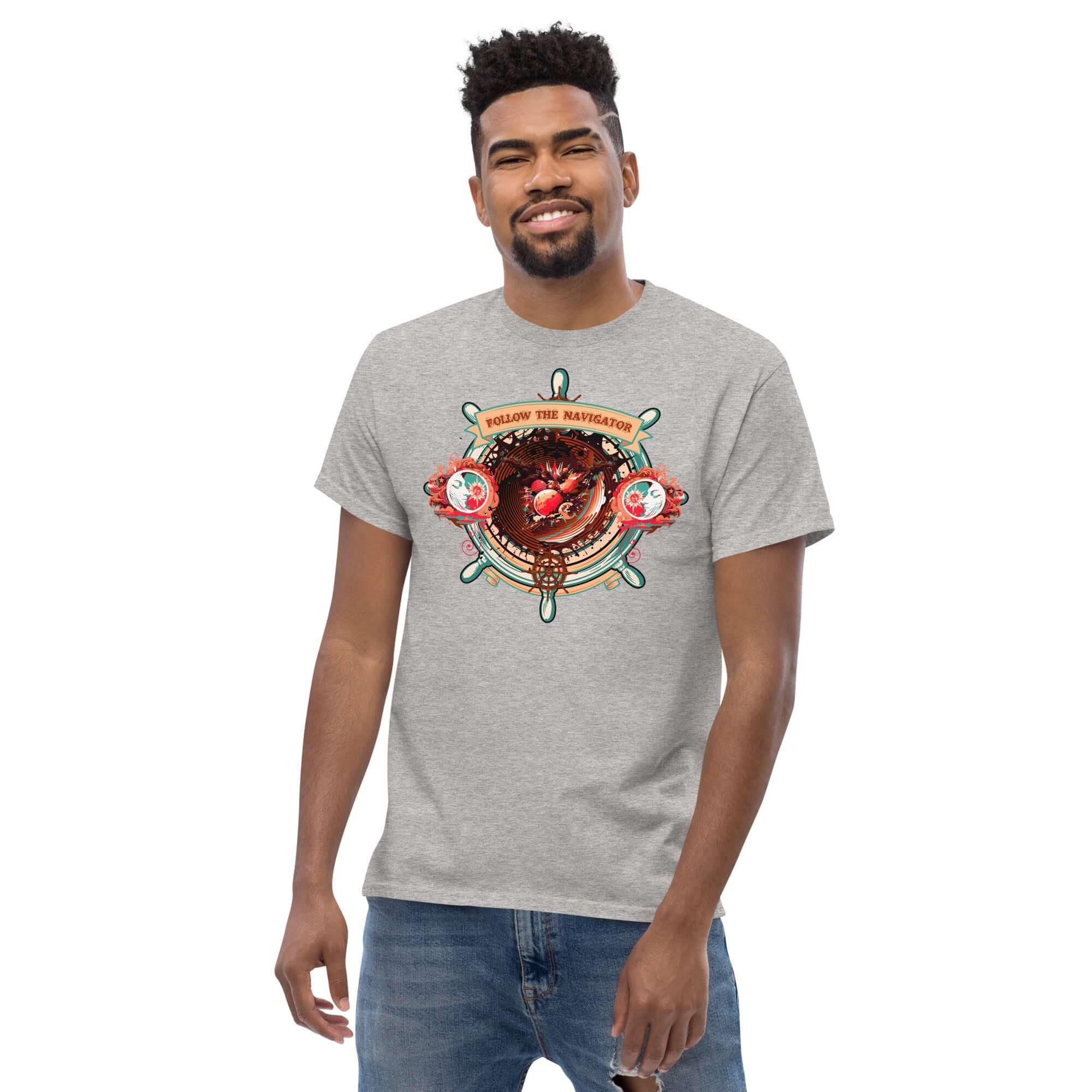 Man wearing Follow the Navigator t-shirt with nautical-celestial compass design, gray color.