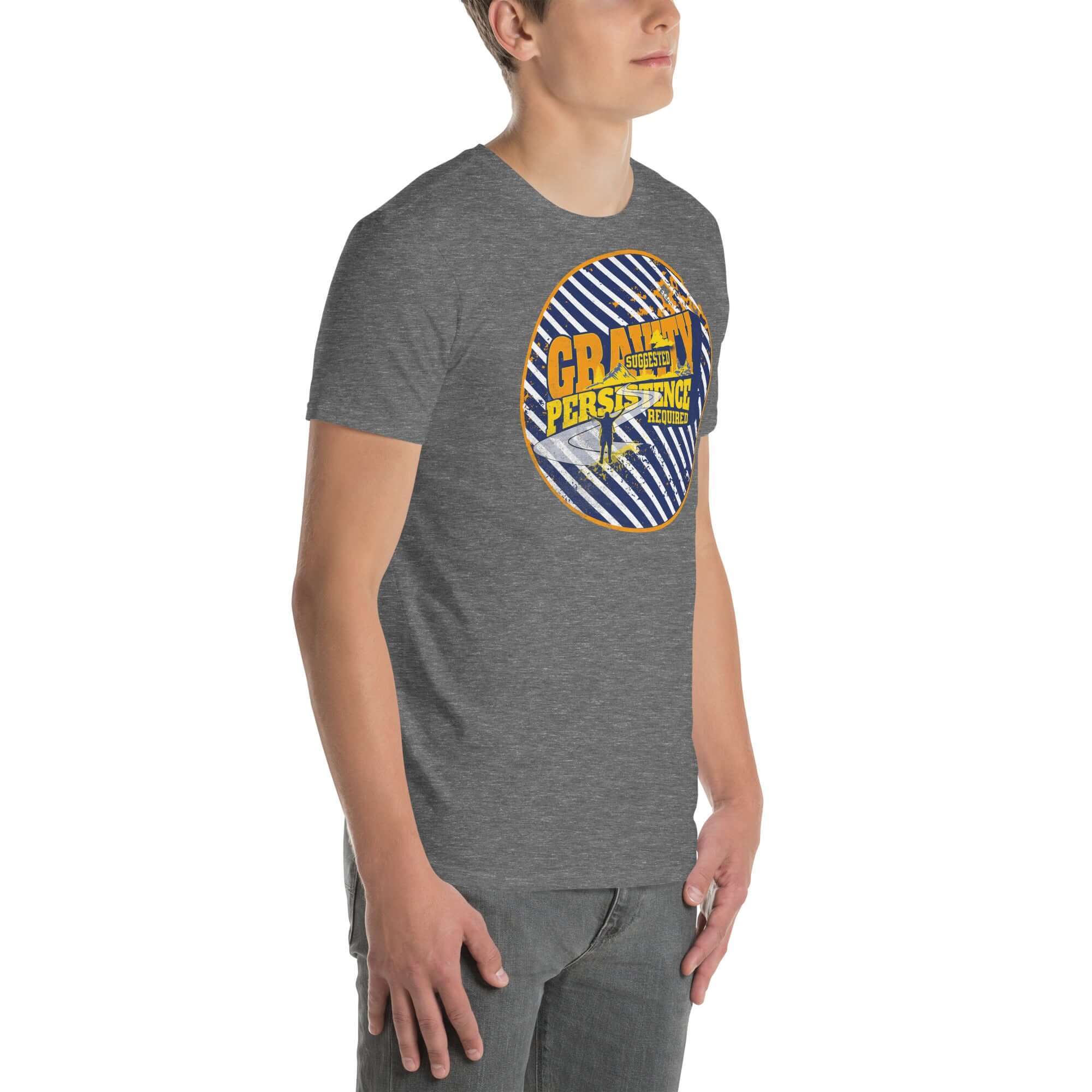 Motivation Apparel "Gravity: Suggested. Persistence: Required." t-shirt with circular emblem and navy blue, white, and yellow design.