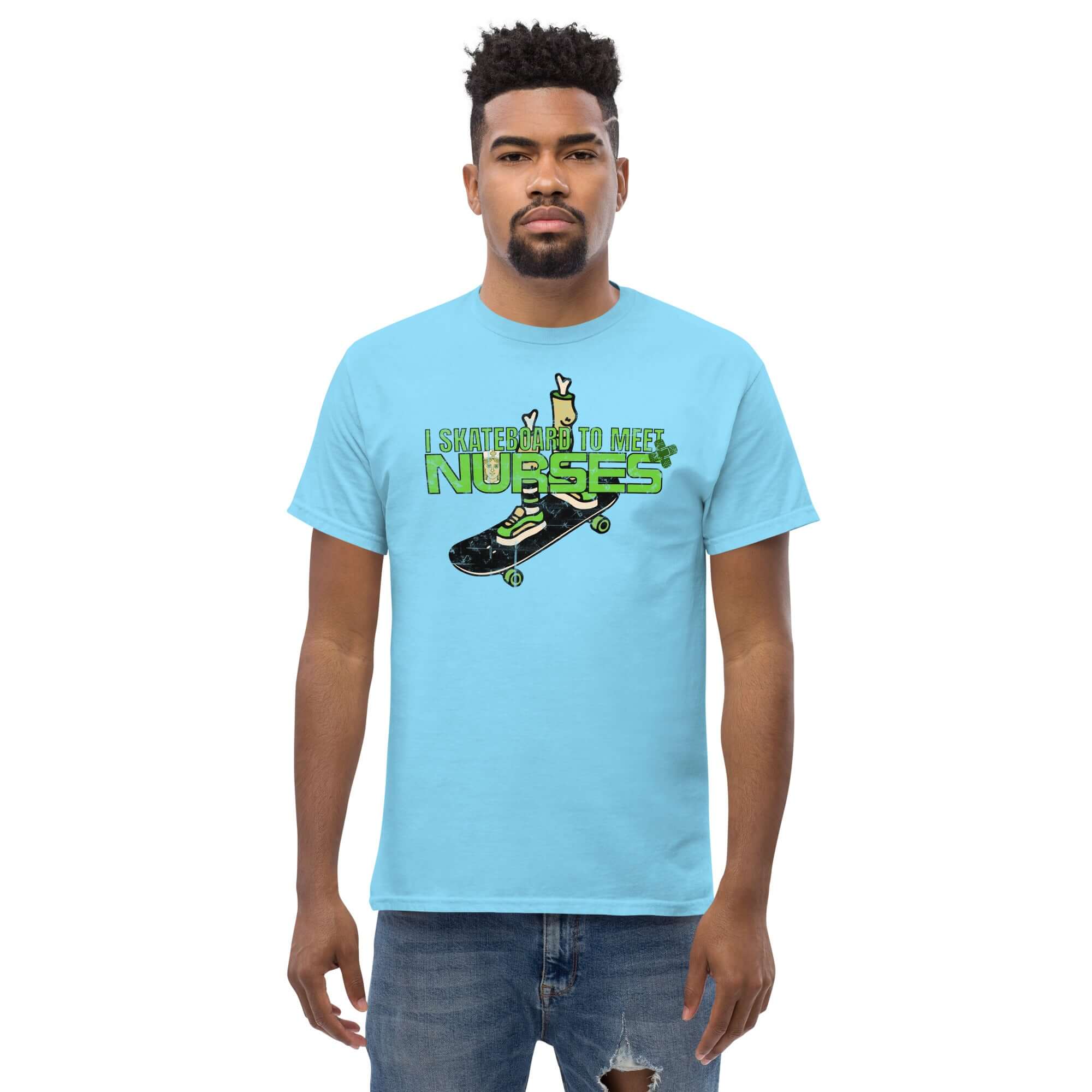 Man wearing 'I Skateboard To Meet Nurses' blue t-shirt with skateboard graphic, showcasing emergency room humor.