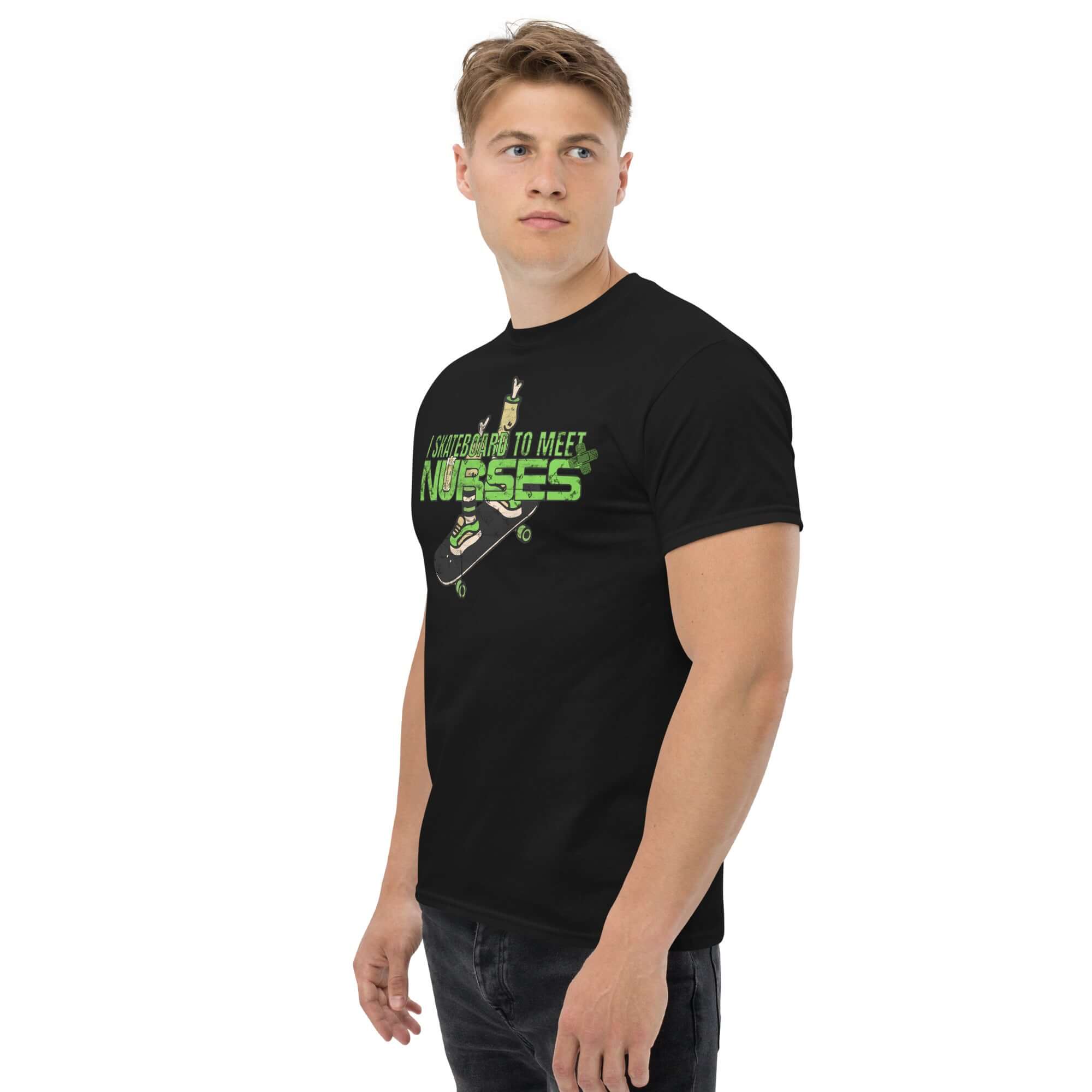 Man wearing a black "I Skateboard To Meet Nurses" t-shirt, showcasing emergency room humor with a skateboard graphic.