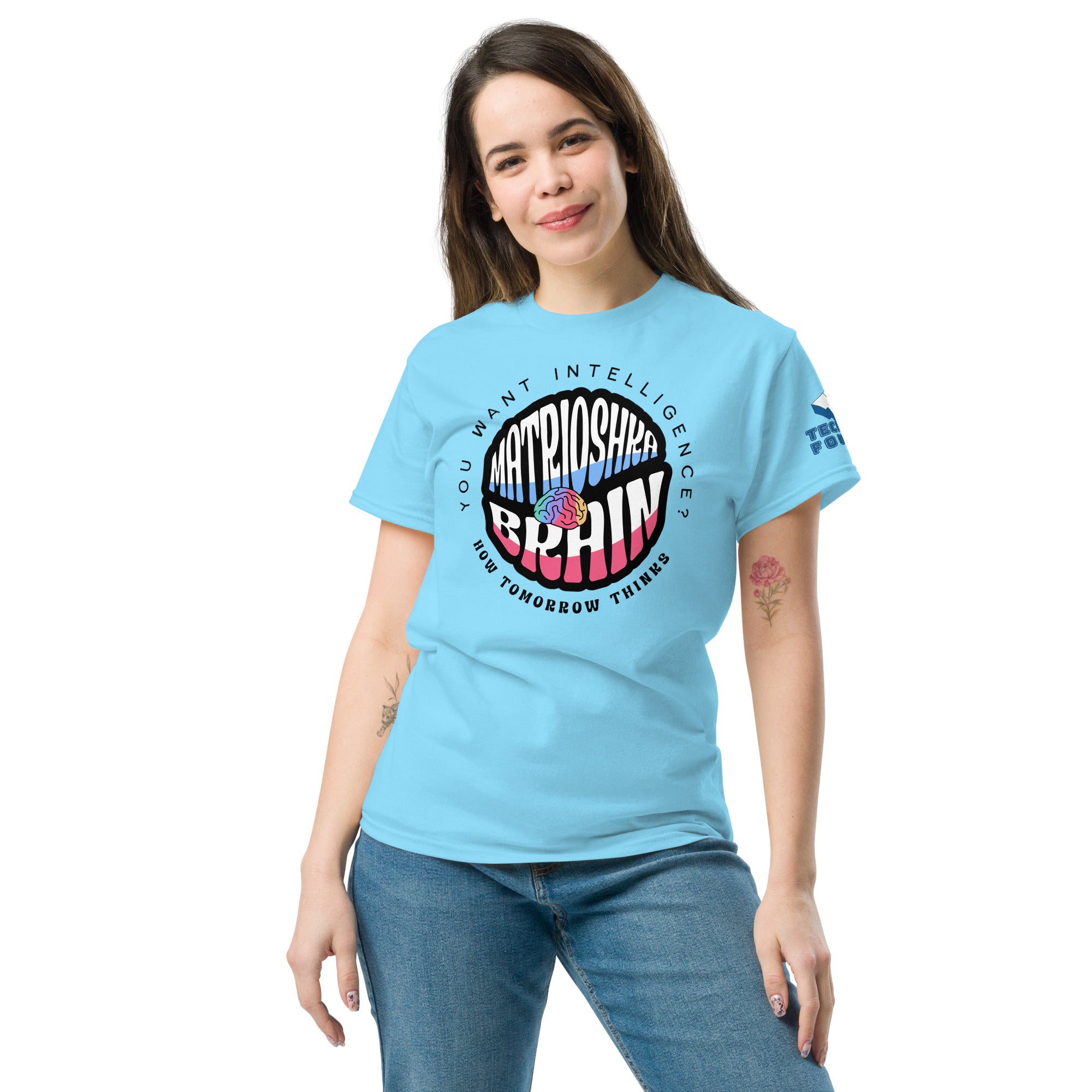 Woman wearing Matrioshka Brain Futurist T-Shirt in blue, featuring bold typography and a cosmic vibe. Perfect for futurists and thinkers.