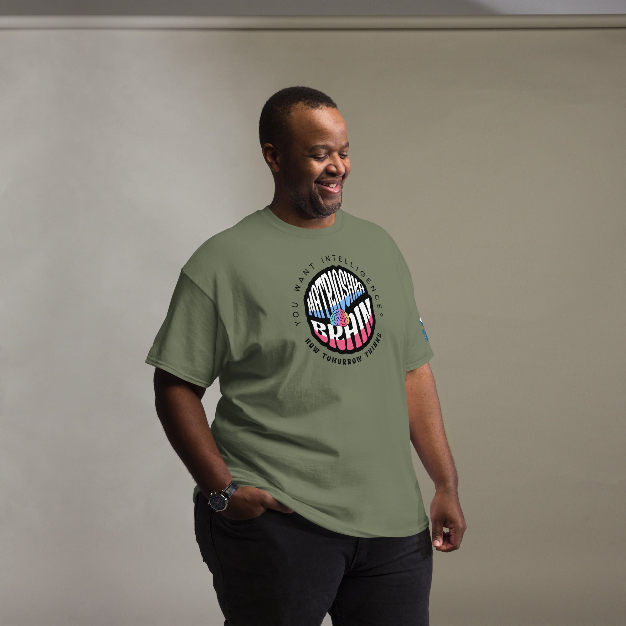 Man wearing Matrioshka Brain Futurist T-Shirt in olive, perfect for enthusiasts of computational megastructures and futuristic fashion.