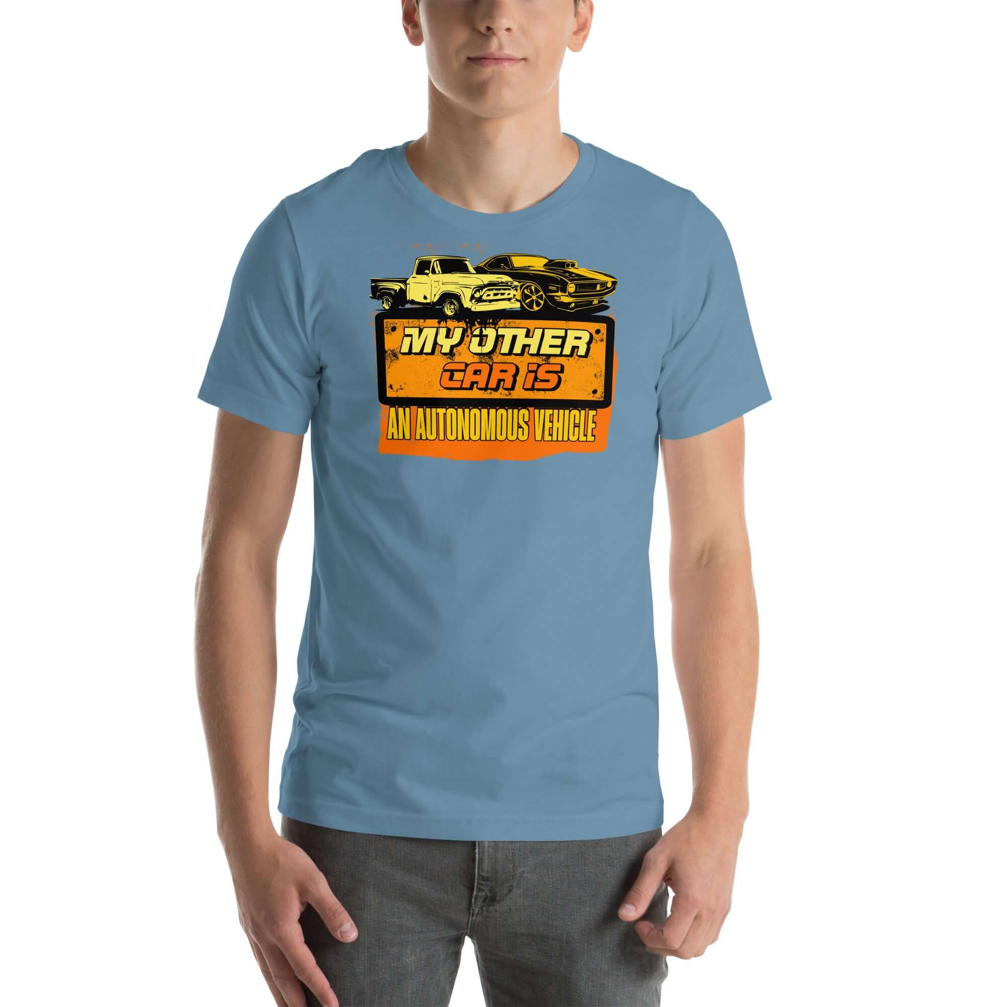 Man wearing a blue T-shirt with "My Other Car Is An Autonomous Vehicle" design featuring vintage cars and tech-inspired graphics.