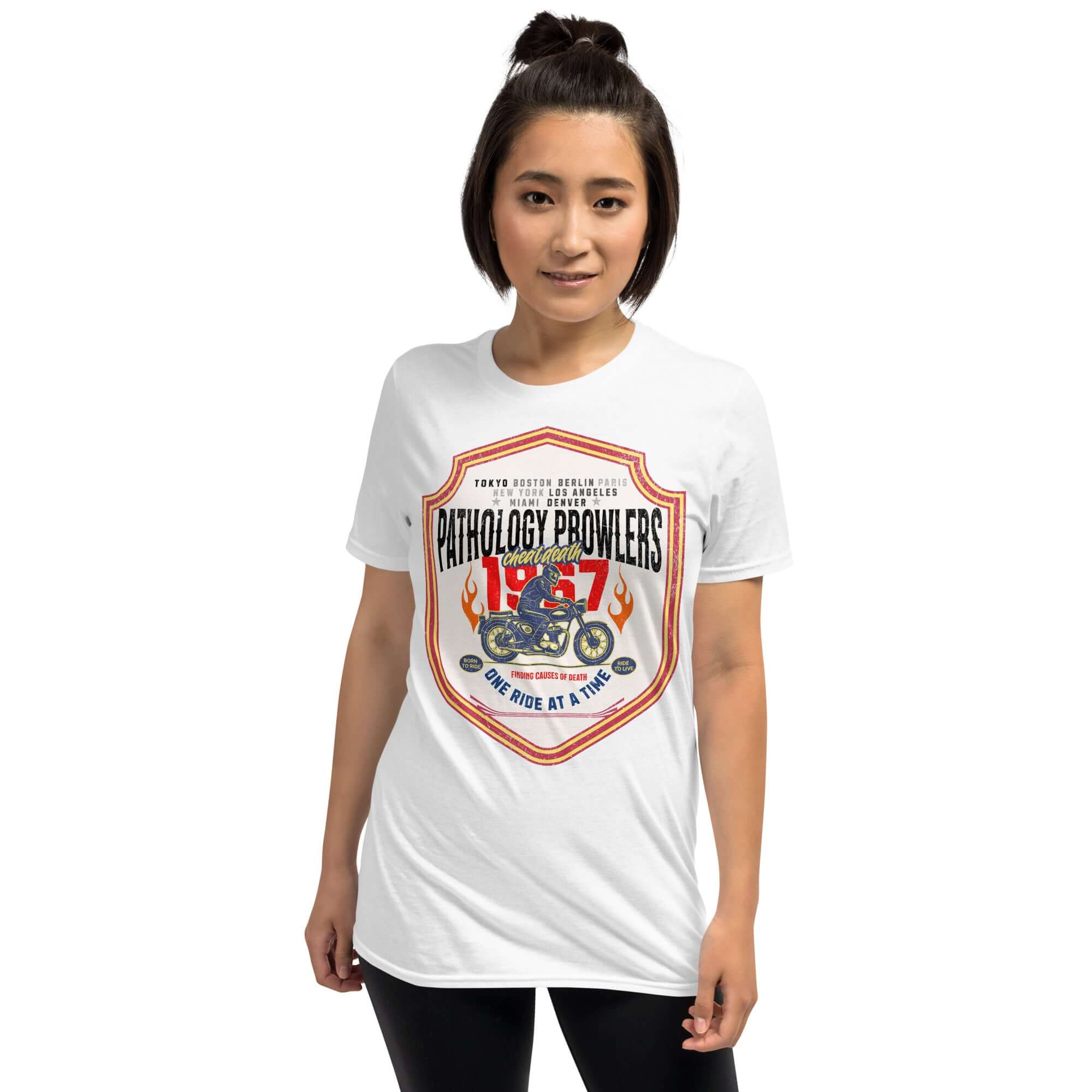 Person wearing a white Pathology Prowlers MC T-shirt featuring a vintage motorcycle club emblem from 1967.