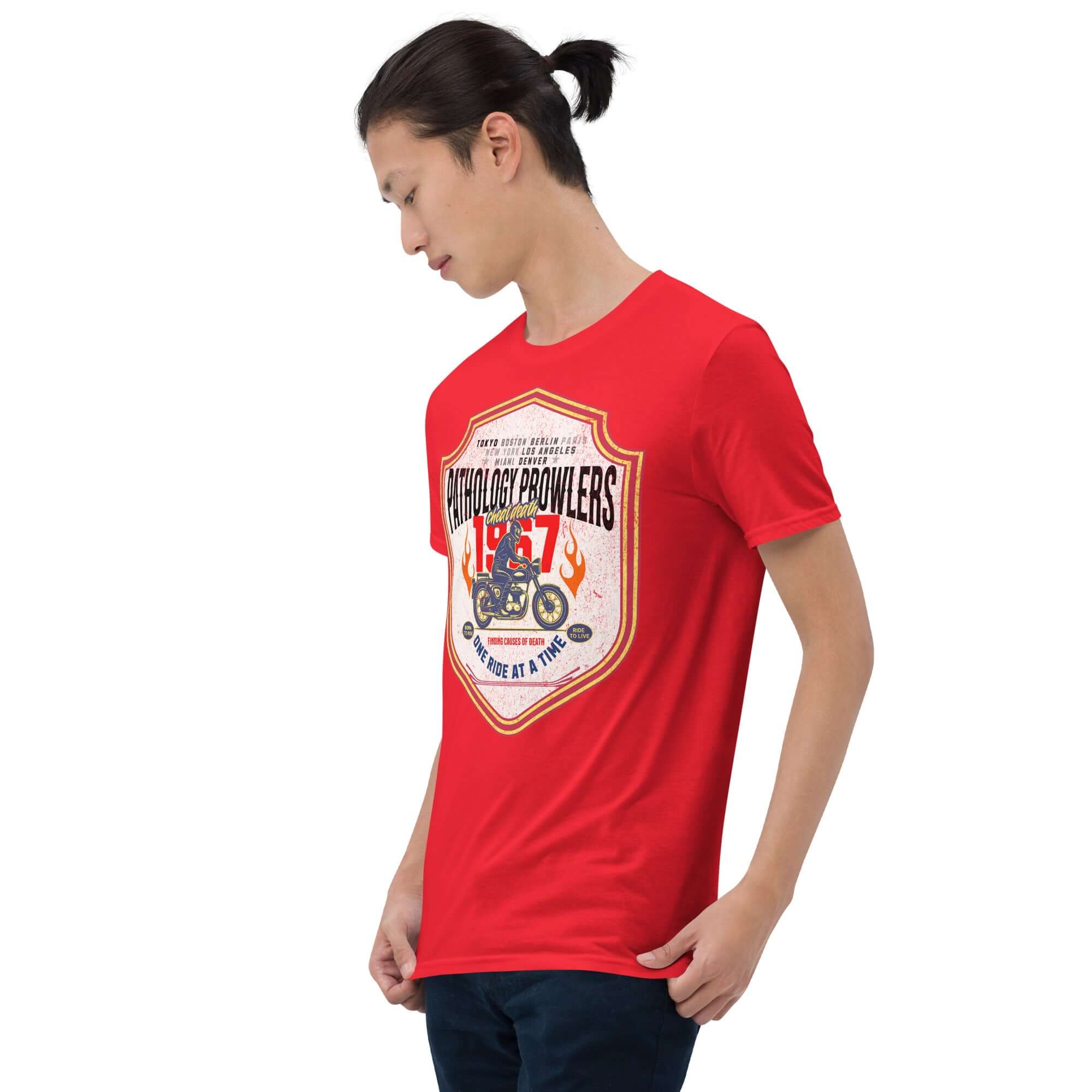 Man wearing a red Pathology Prowlers MC T-Shirt featuring a vintage shield emblem for a forensic motorcycle club.