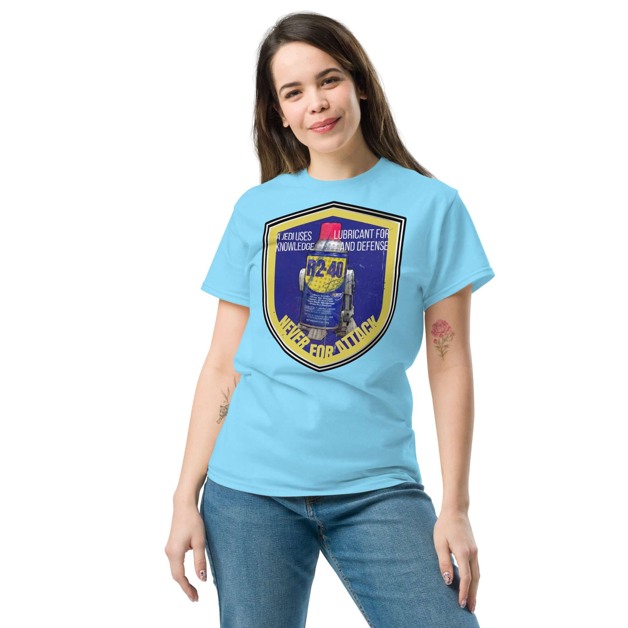 Woman wearing R2-D2 WD-40 parody t-shirt, inspired by Star Wars and mechanic humor. Graphic features humorous slogan and iconic design.