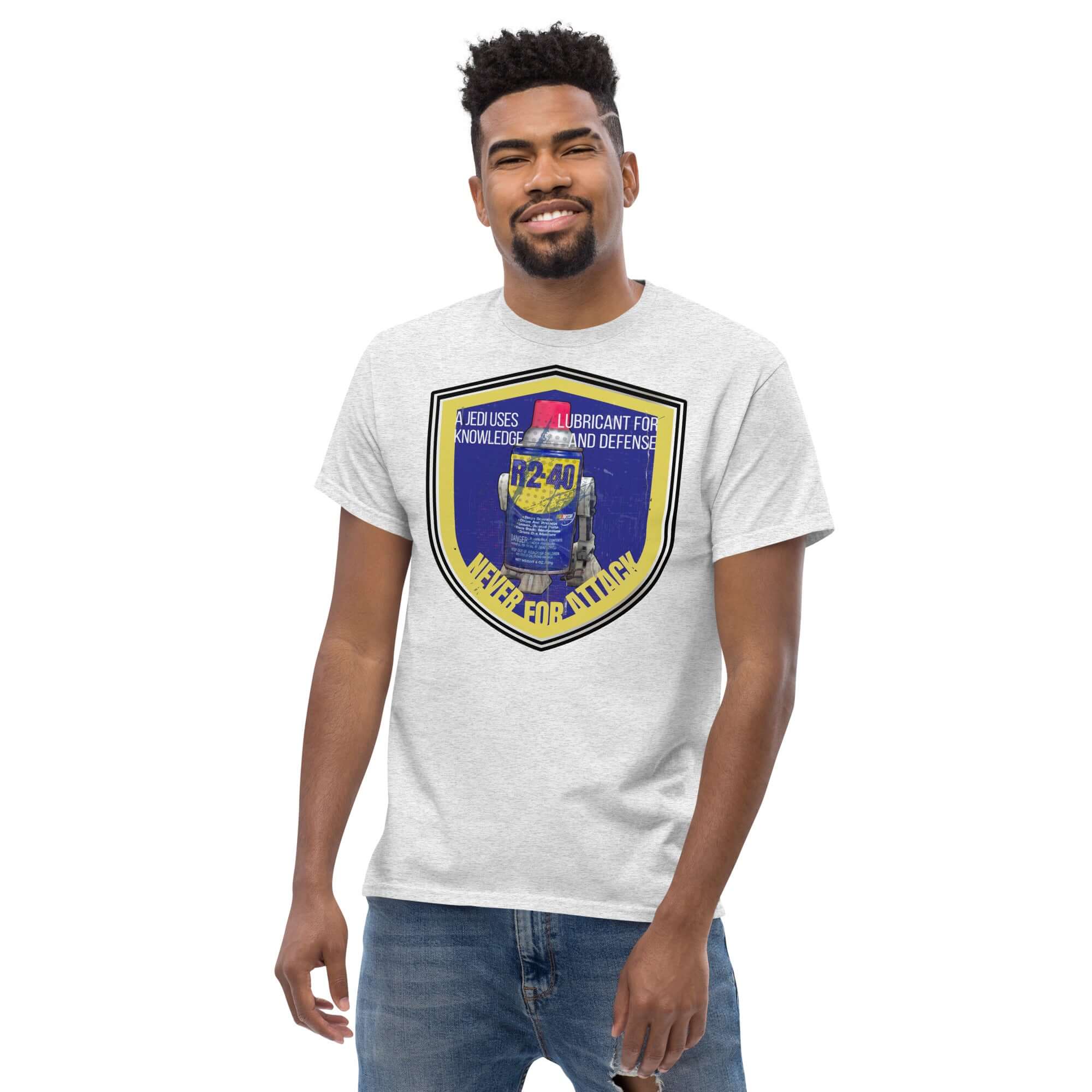 Man wearing R2-D2 WD-40 Parody T-Shirt, featuring Star Wars mechanic humor design with text "A Jedi Uses Lubricant For Knowledge".