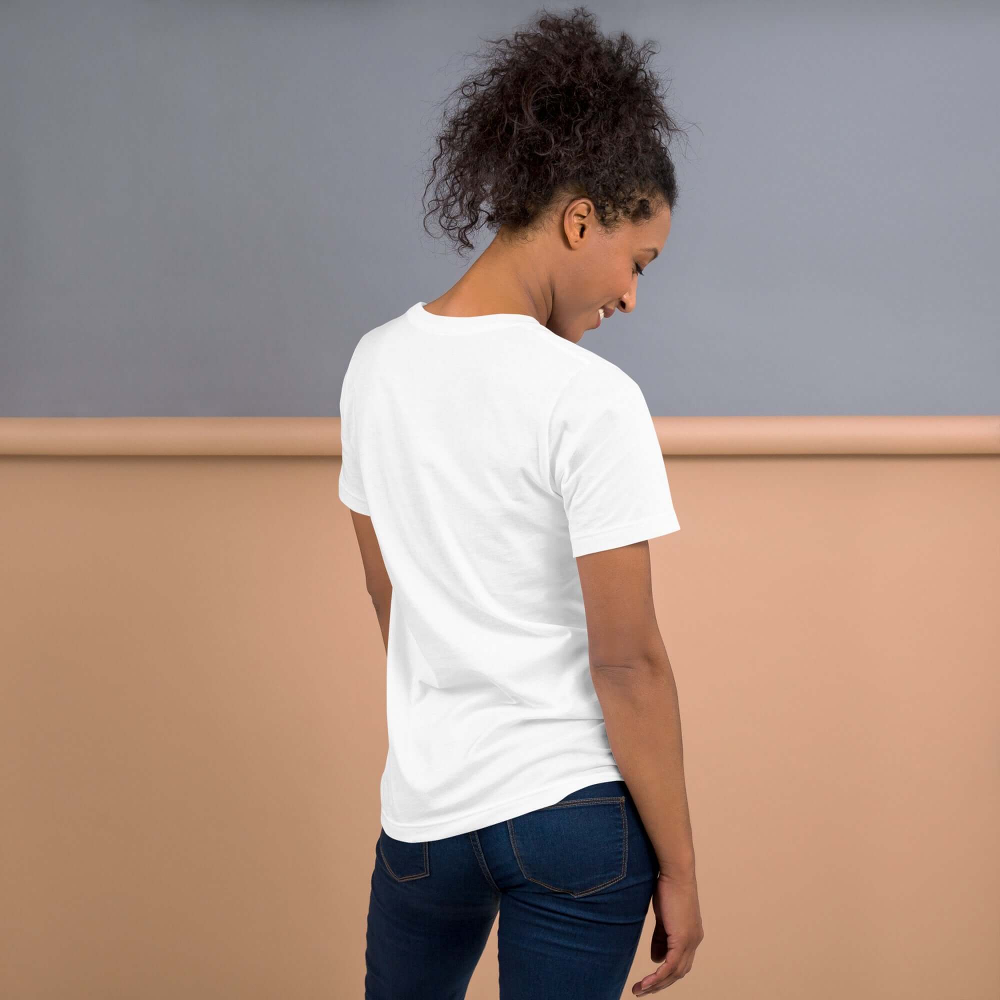 Back view of a woman wearing a Schrödinger's Cat T-Shirt, showcasing a casual style with a quantum physics theme.