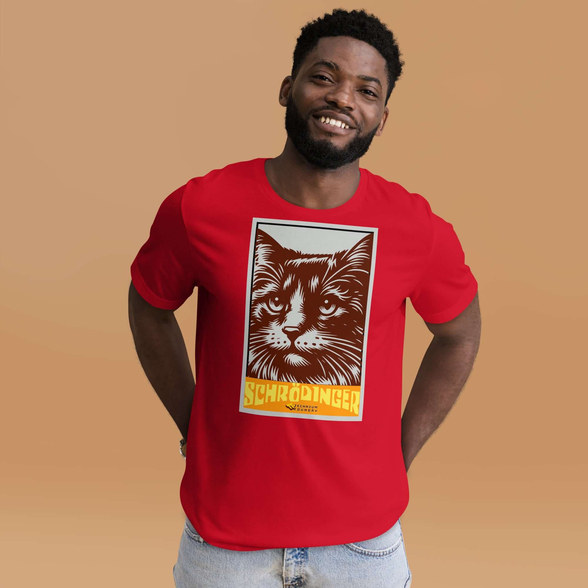 Man wearing Schrödinger's Cat T-Shirt with retro design, showcasing famous quantum superposition cat on red fabric.