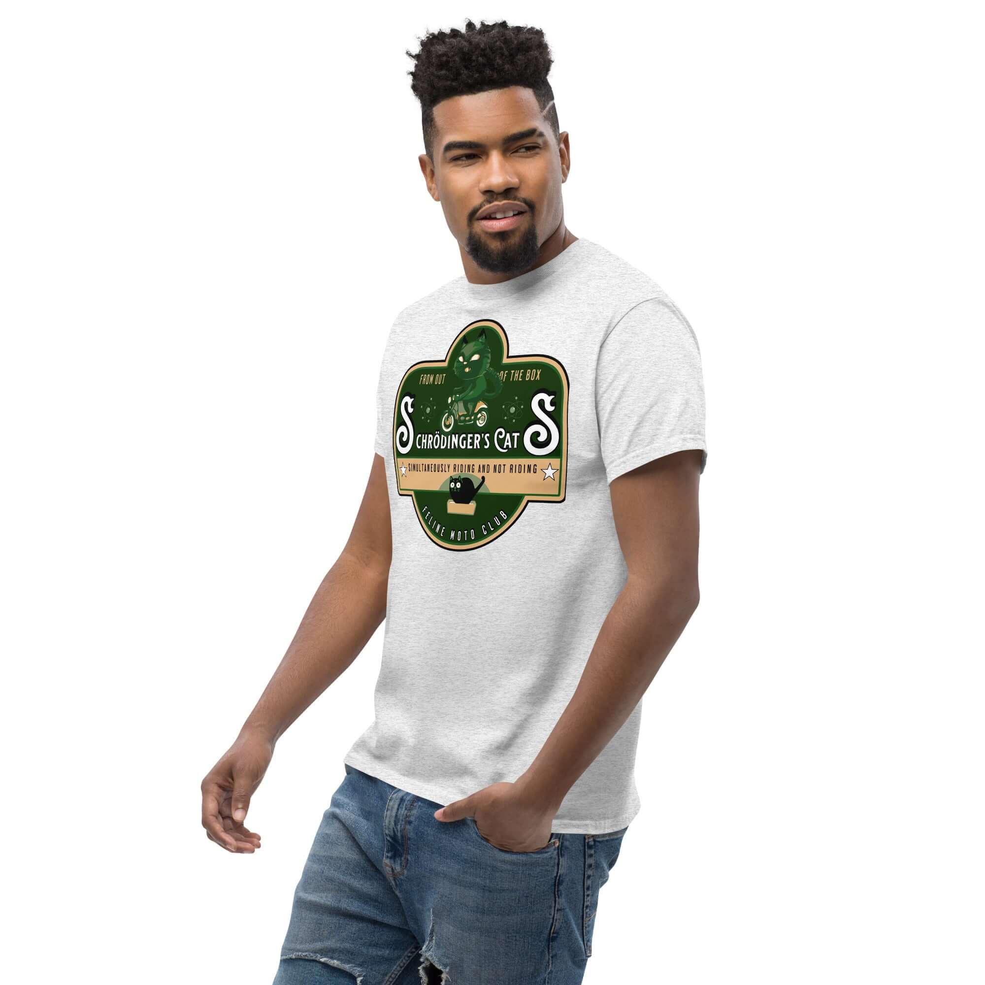 Man wearing Schrödinger's Cats motorcycle club t-shirt featuring green cat logo, ideal for quantum physics and biker enthusiasts.