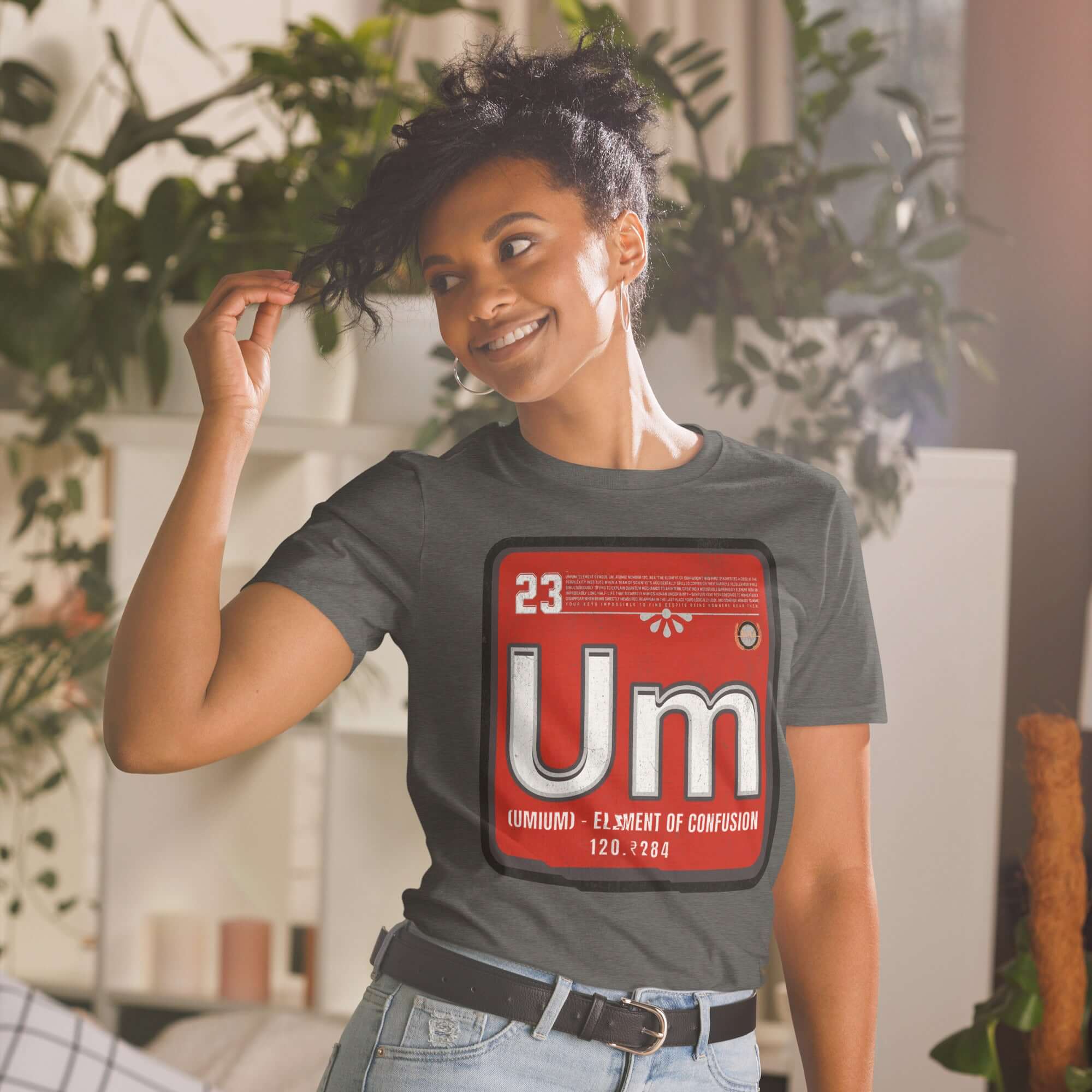 Woman wearing Umium Element T-Shirt featuring Periodic Table of Confusion design, science humor apparel