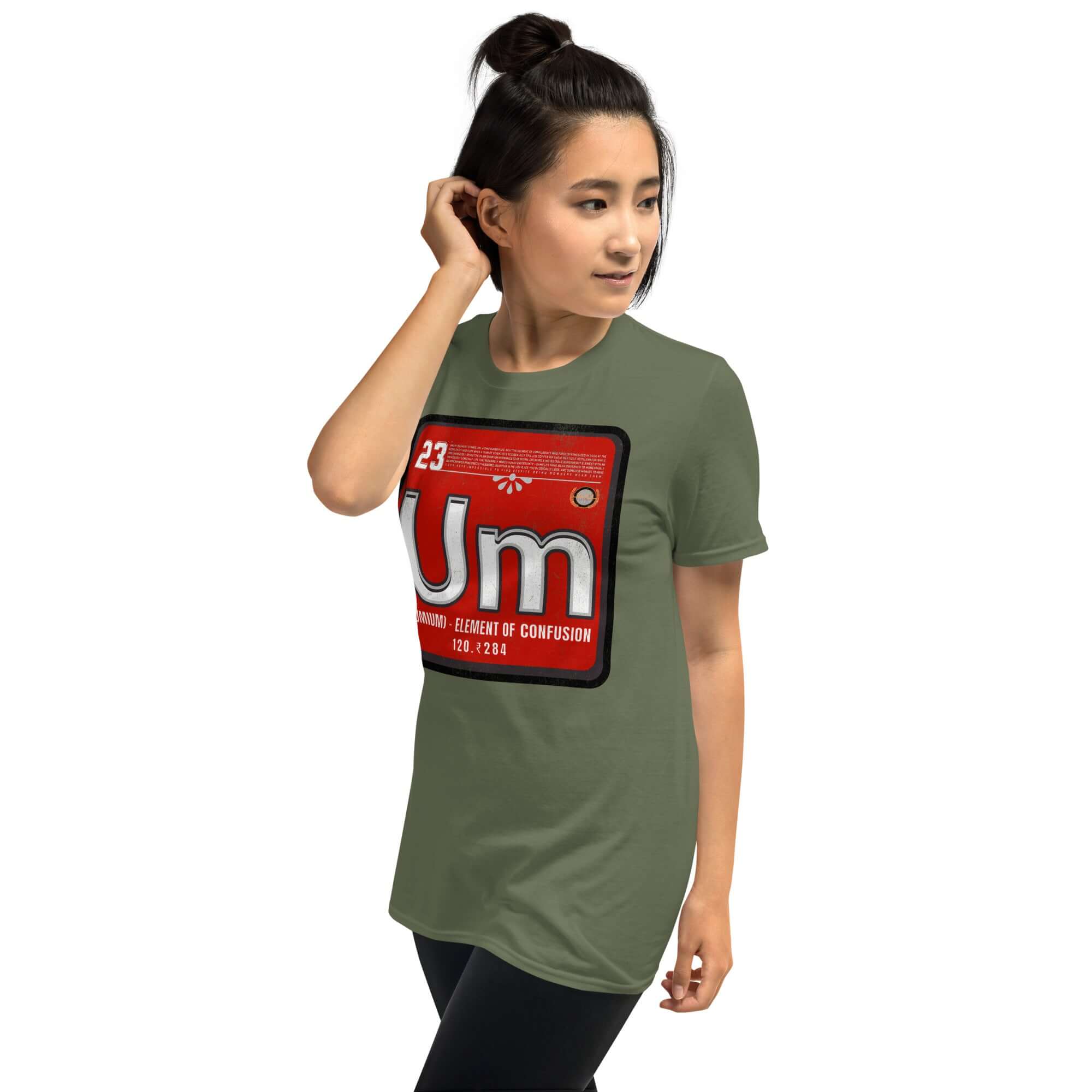 Person wearing Umium Element T-Shirt featuring Periodic Table of Confusion design on a vibrant red background.