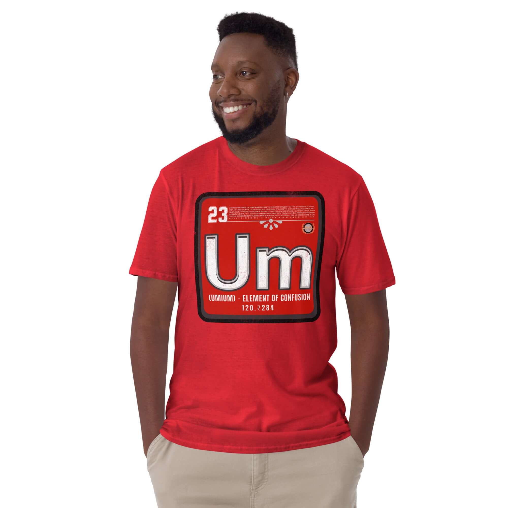 Man wearing red 'Umium Element of Confusion' t-shirt, featuring periodic table design, against white background.