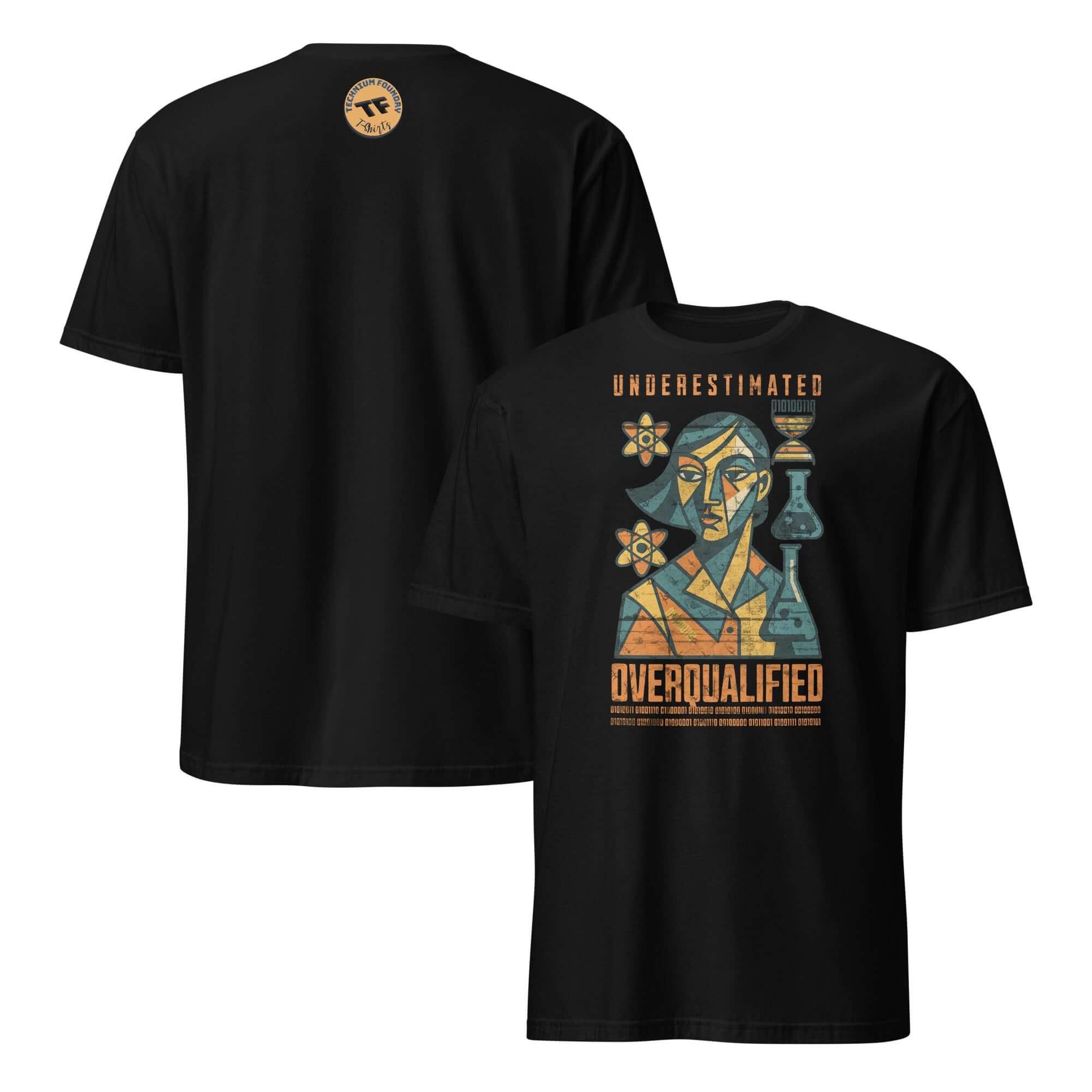 Black t-shirt featuring 'Underestimated Overqualified' design with STEM-themed graphics and empowerment message.