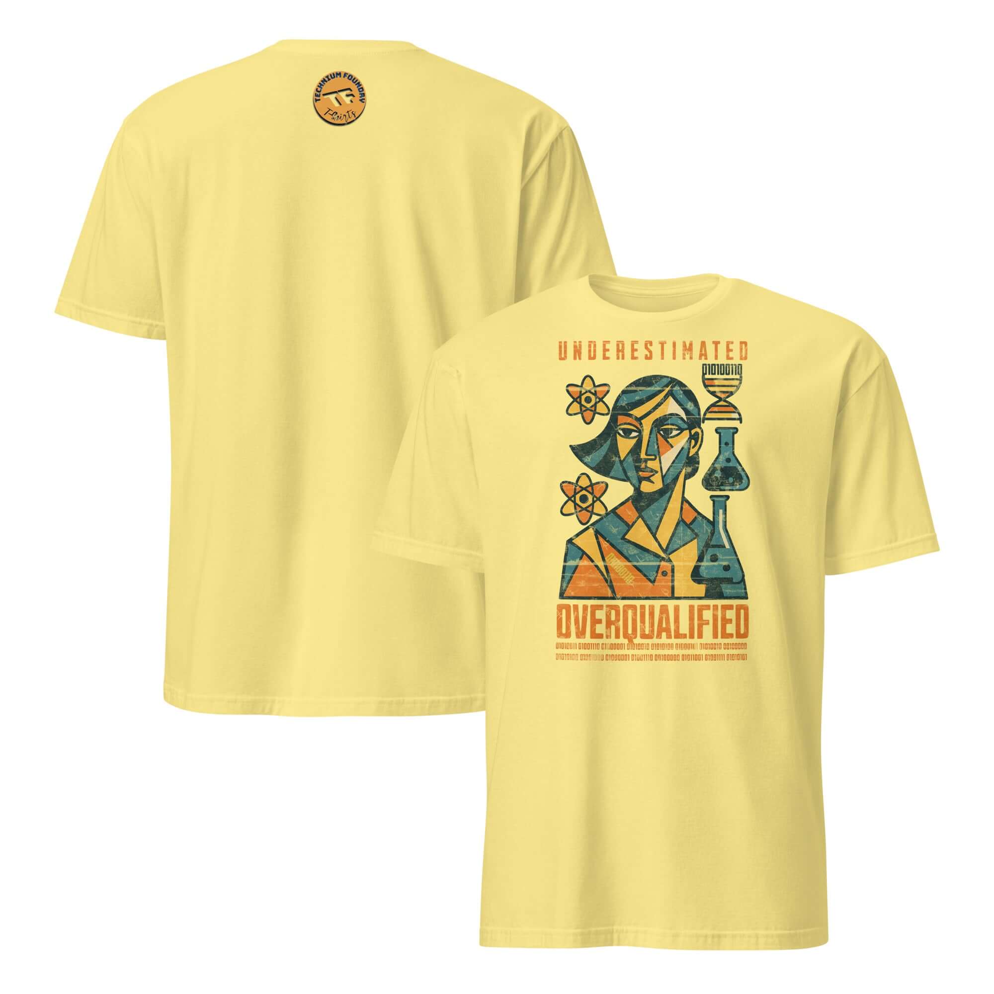 Yellow t-shirt with 'Underestimated Overqualified' design featuring a woman and scientific elements, promoting STEM empowerment.