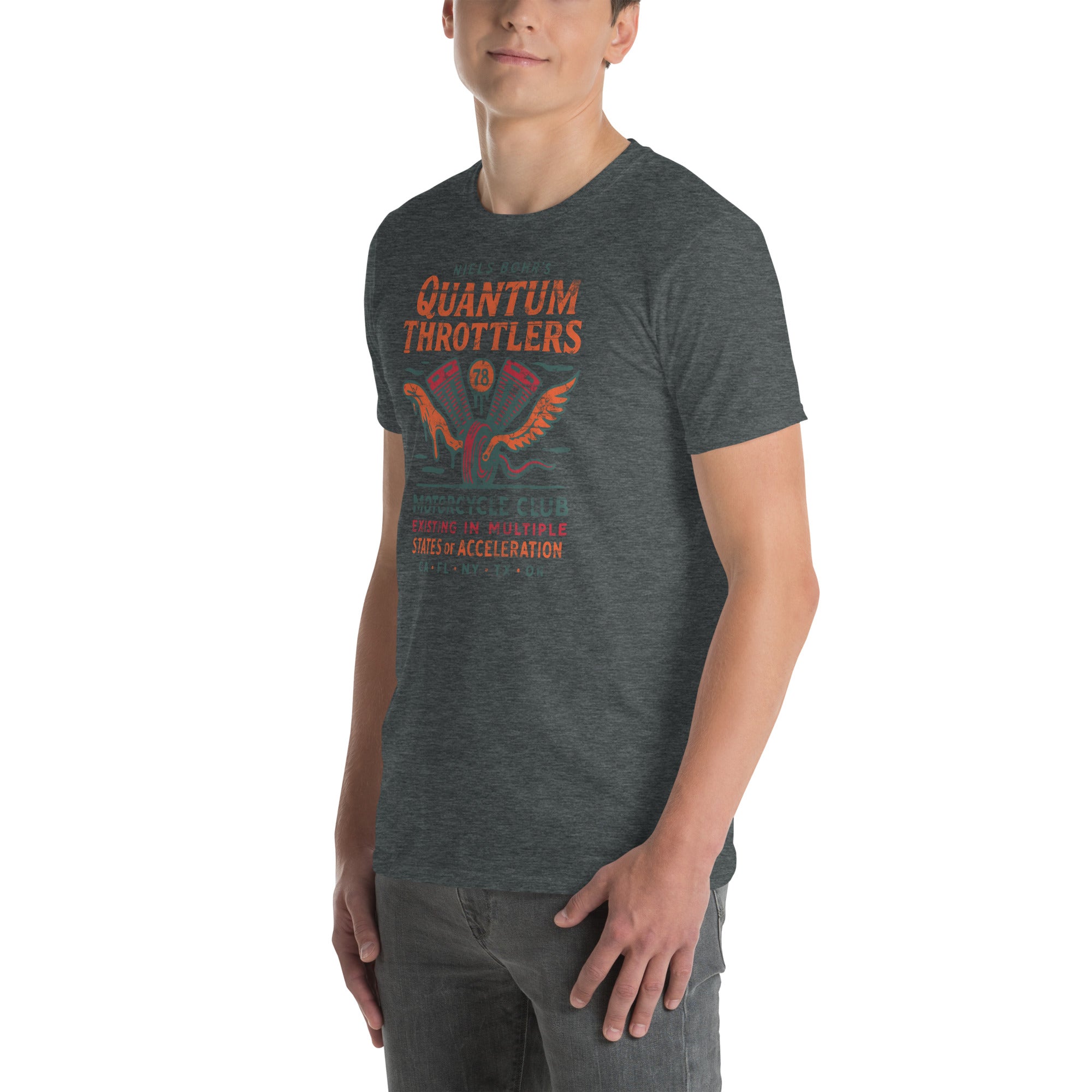 Man wearing a Quantum Throttlers Motorcycle Club t-shirt with Niels Bohr design, blending physics and biking.