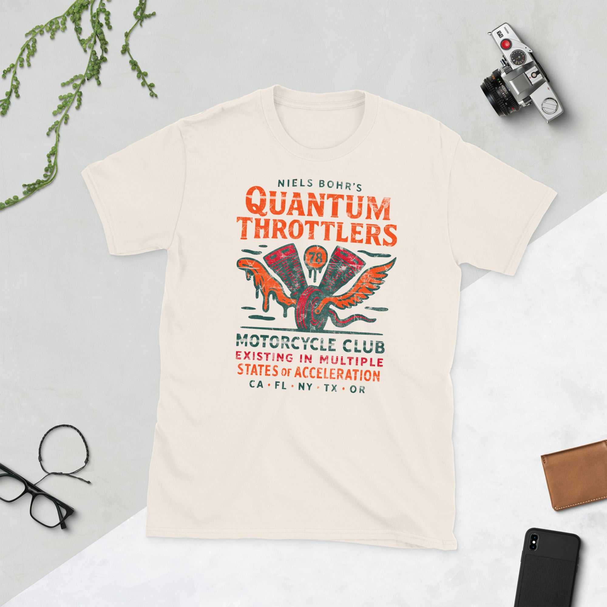 Niels Bohr's Quantum Throttlers Motorcycle Club T-Shirt featuring a vintage winged engine design. Perfect for physics and motorcycle enthusiasts.